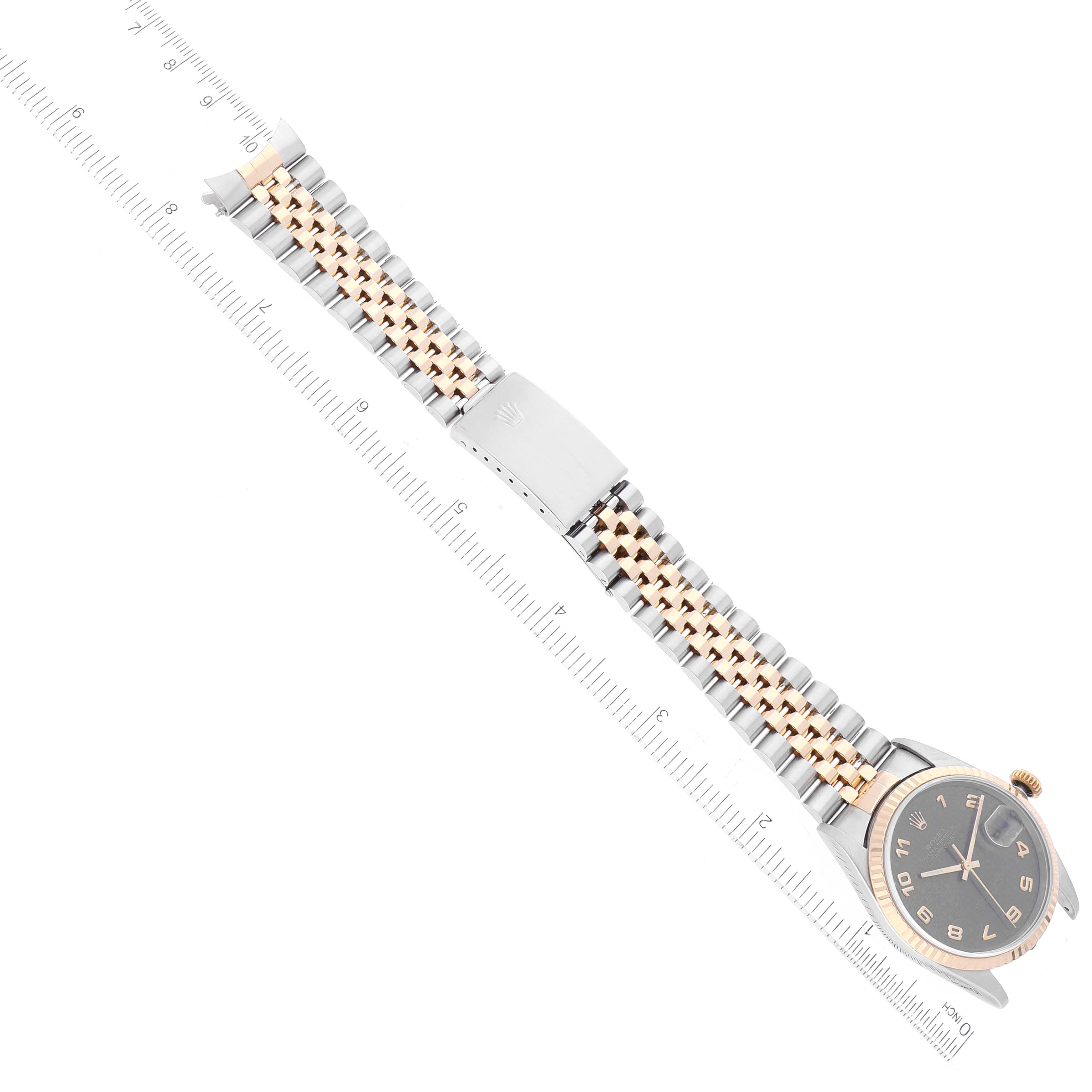 The image shows a Rolex Datejust 16233 Men's Steel and Gold (two tone) Grey Dial 16233 Men's Steel and Gold (two tone) Grey Dial watch laid flat with its bracelet and clasp visible, aligned with a ruler.