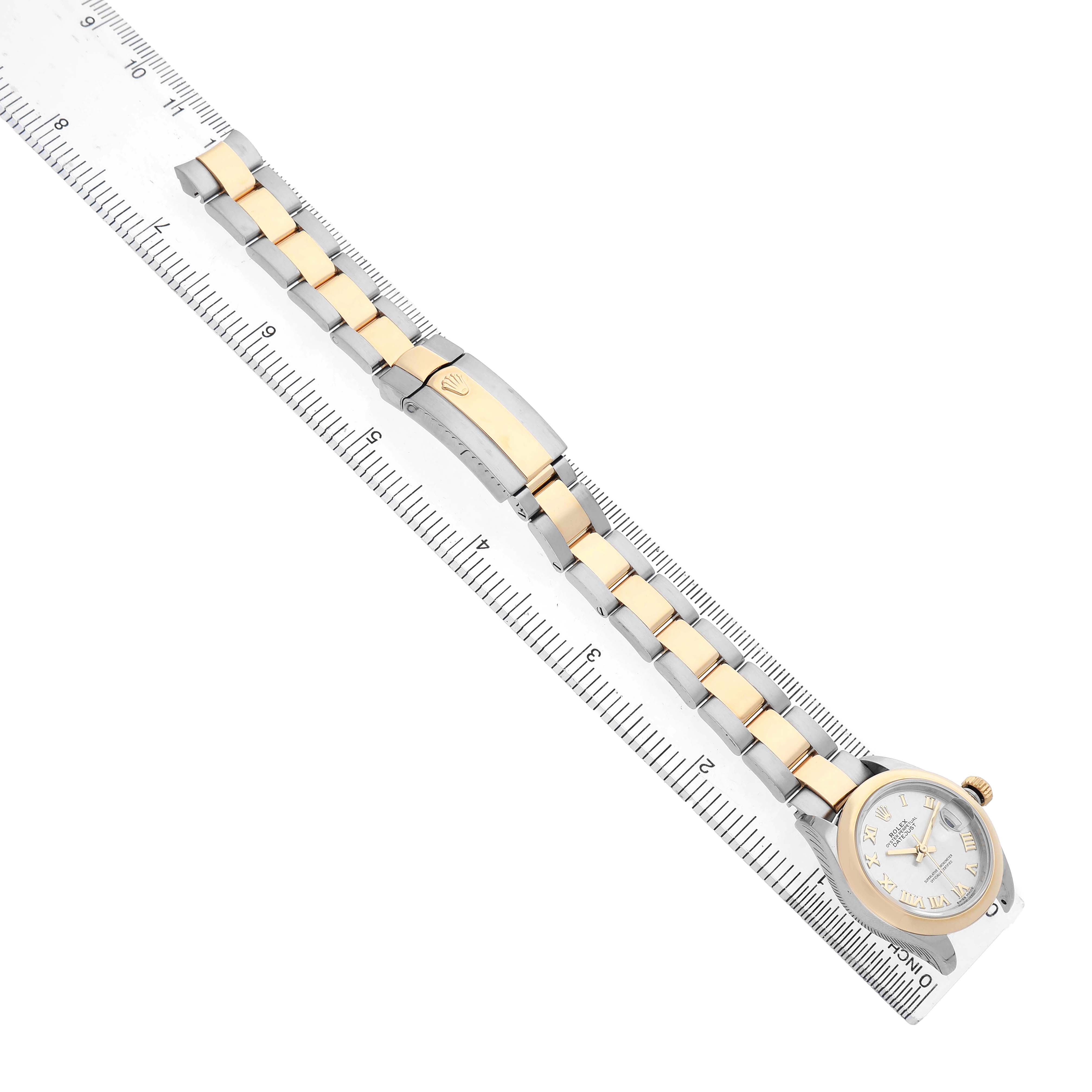 The Rolex Datejust 279163 Women's Steel and Gold (two tone) Silver Dial watch is shown from a top-down angle, highlighting the bracelet, clasp, and dial.