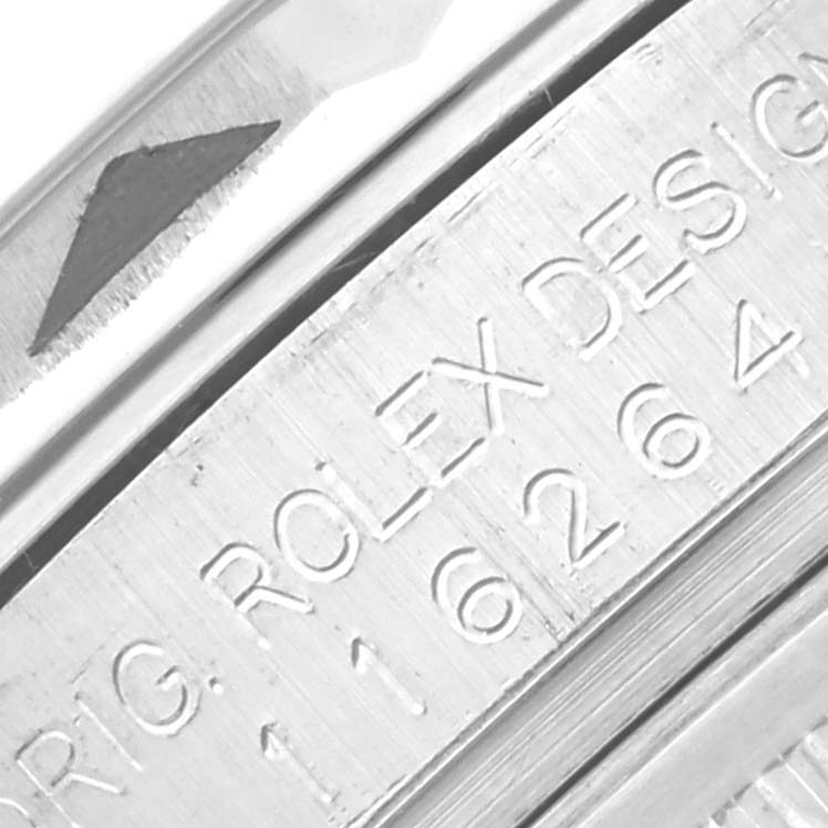 The image shows a close-up of the engraved model number and "ROLEX DESIGN" text on the case of the Rolex Turn-o-Graph 116264 Men
s Stainless Steel Blue Dial 116264 Men
s Stainless Steel Blue Dial watch.