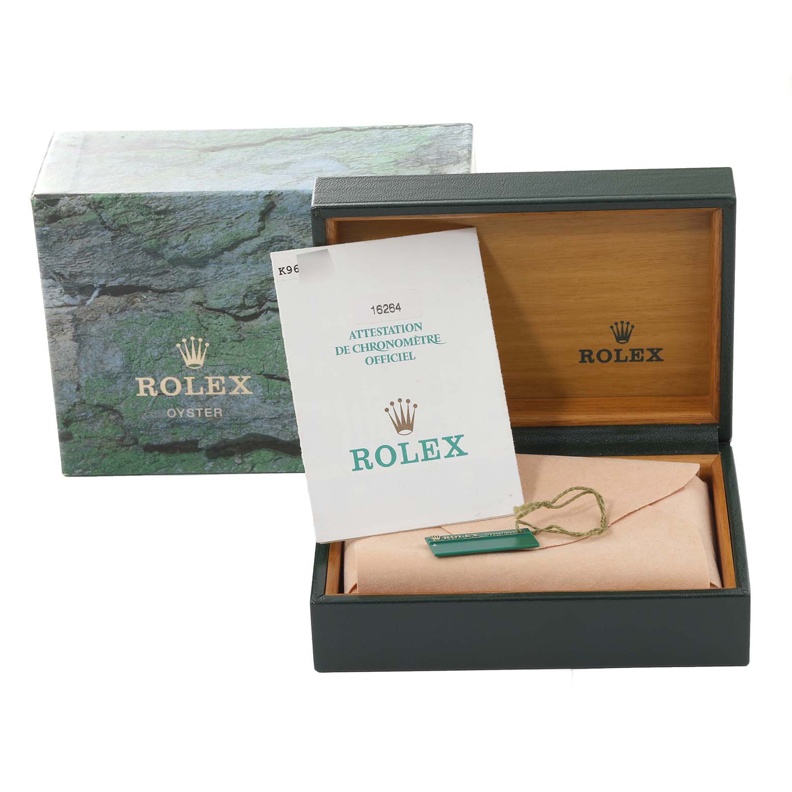 The image shows the box and documentation for the Rolex Turn-o-Graph 16264 Men's Stainless Steel Black Dial 16264 Men's Stainless Steel Black Dial model, with the watch partially visible inside its case.
