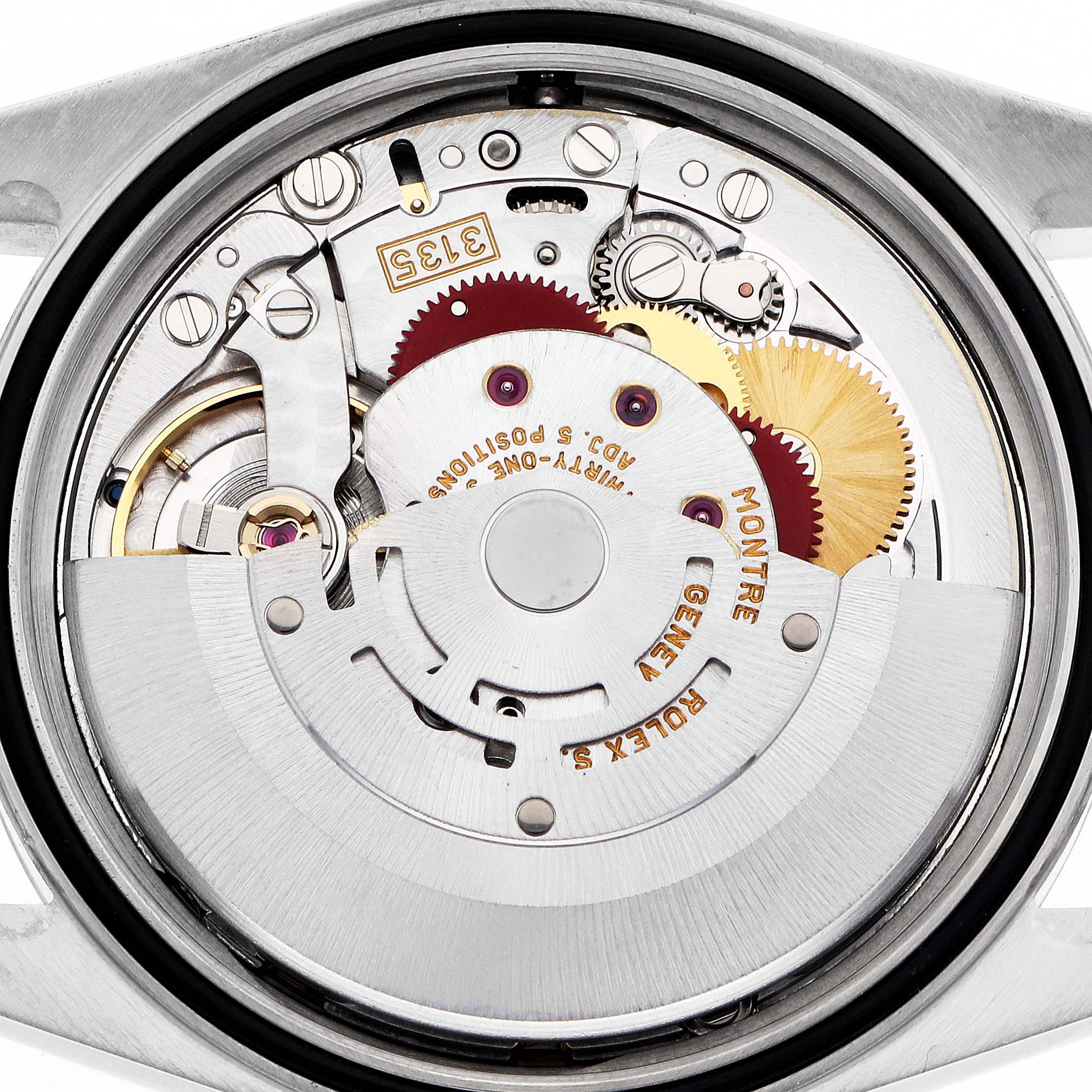 The image shows a close-up of the Rolex Datejust 16203 Men
s Steel and Gold (two tone) Mother of Pearl Dial movement, highlighting gears and mechanisms from the back.