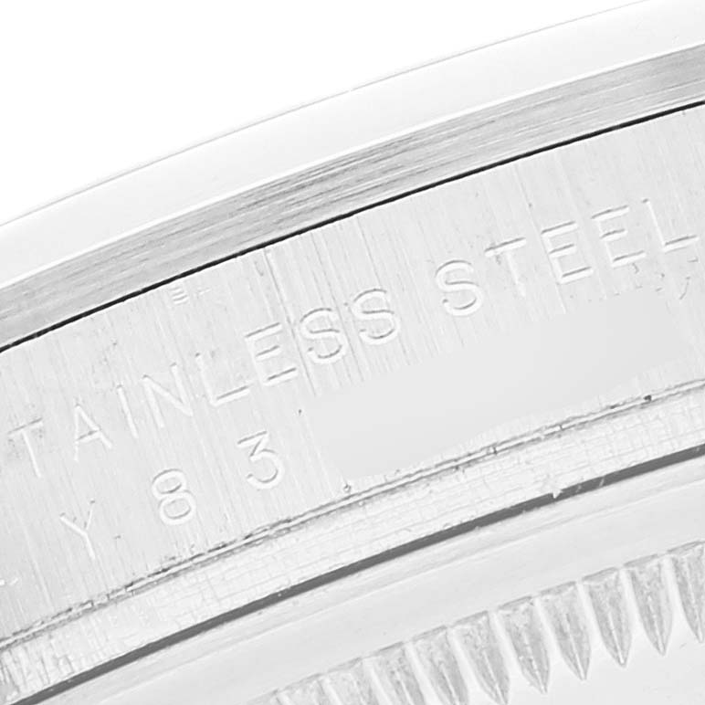 This close-up image shows the engraving on the stainless steel caseback of a Rolex Explorer 114270 Men's Stainless Steel Black Dial 114270 Men's Stainless Steel Black Dial watch.