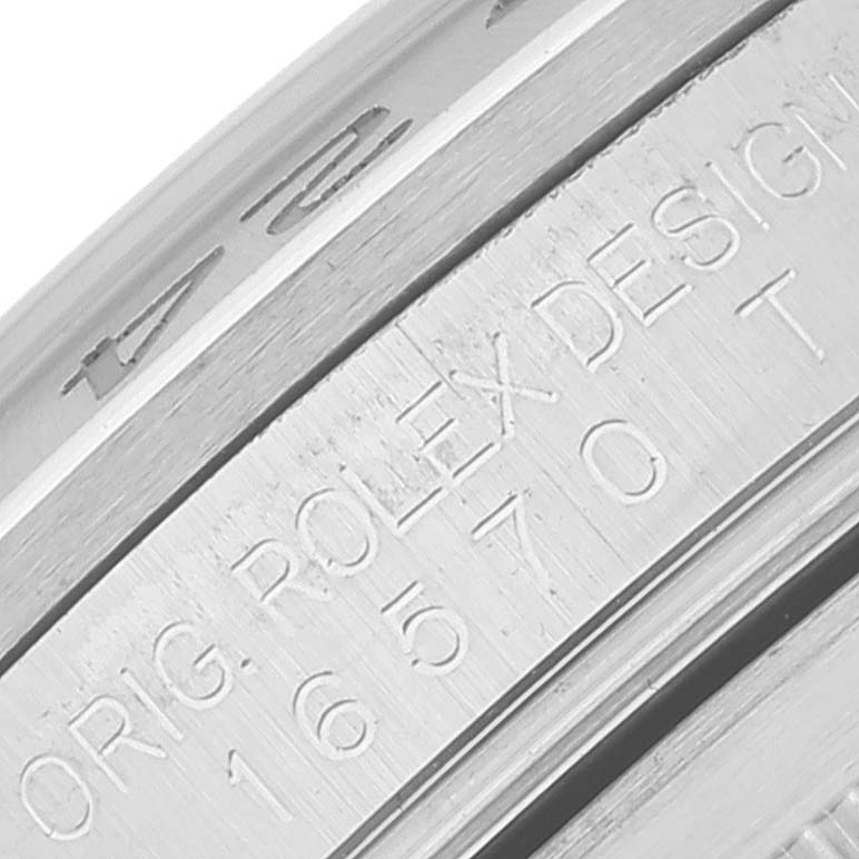 This close-up image shows the side engraving and part of the bezel of the Rolex Explorer 16570 Men's Stainless Steel Black Dial 16570 Men's Stainless Steel Black Dial watch model.
