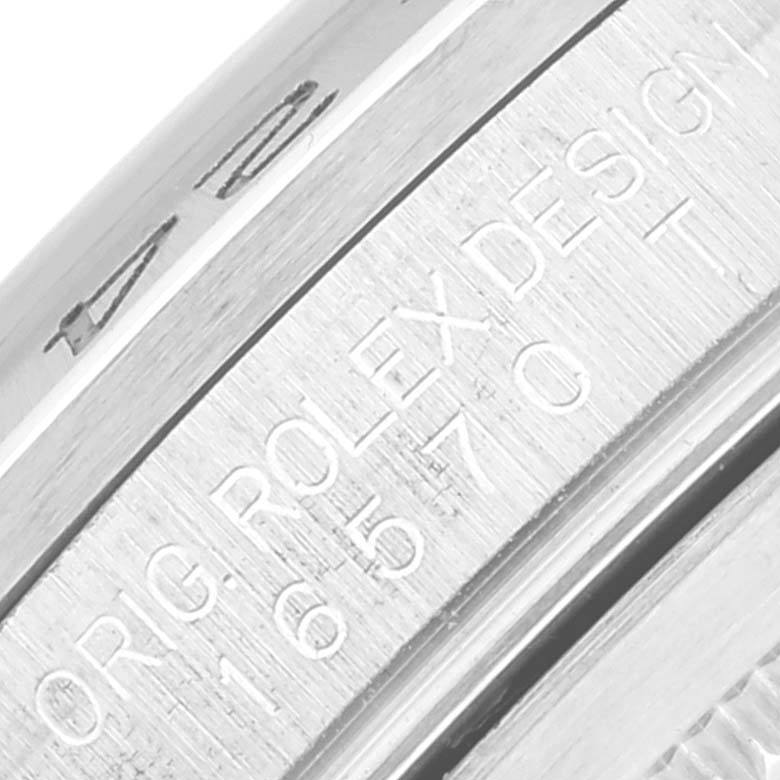 The image shows a close-up of the inner bezel and serial engraving on a Rolex Explorer 16570 Men's Stainless Steel Black Dial 16570 Men's Stainless Steel Black Dial watch.