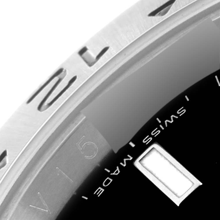 The image shows a close-up of the bezel and part of the dial of a Rolex Explorer 16570 Men's Stainless Steel Black Dial 16570 Men's Stainless Steel Black Dial watch, displaying the "Swiss Made" text.