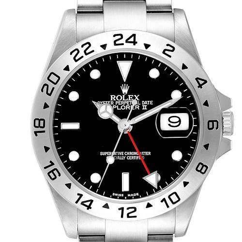 The image shows the front view of a Rolex Explorer II watch with details of the dial, bezel, and bracelet.