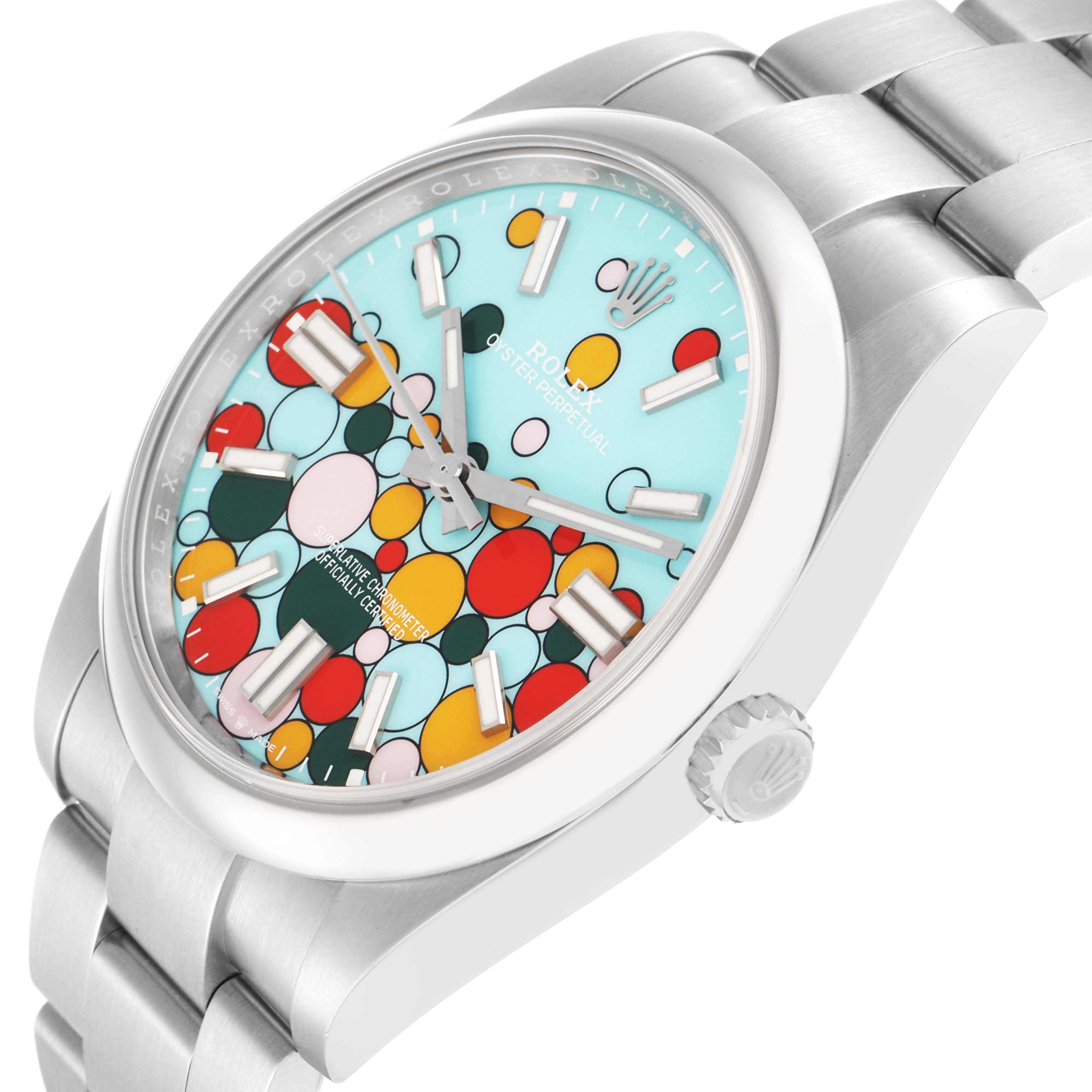 The Rolex Oyster Perpetual 124300 Men
s Stainless Steel Blue Dial watch is shown at a three-quarter angle, featuring its colorful dial, case, and part of the bracelet.