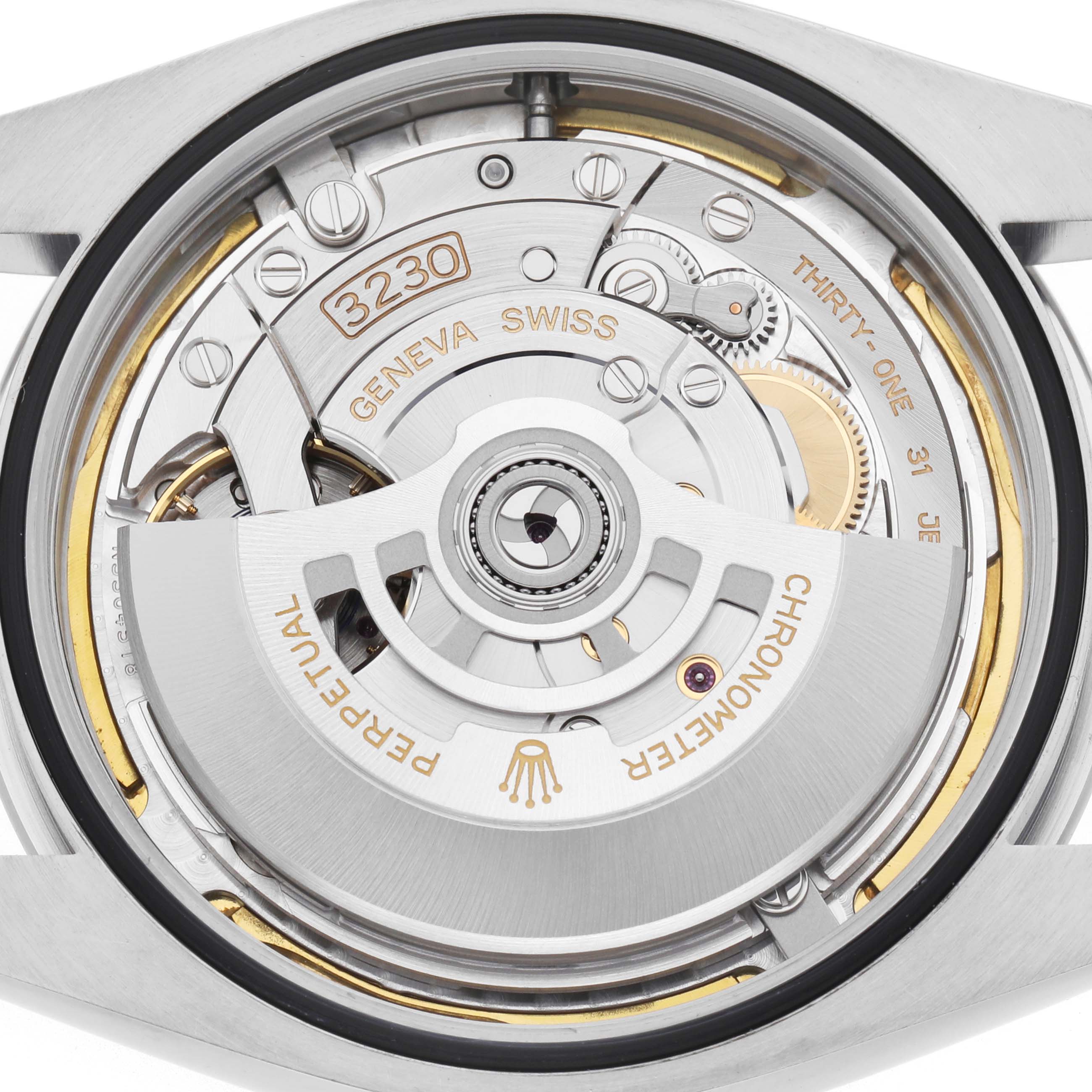 The image shows the movement mechanism of a Rolex Oyster Perpetual 124300 Men
s Stainless Steel Blue Dial watch from a rear angle.