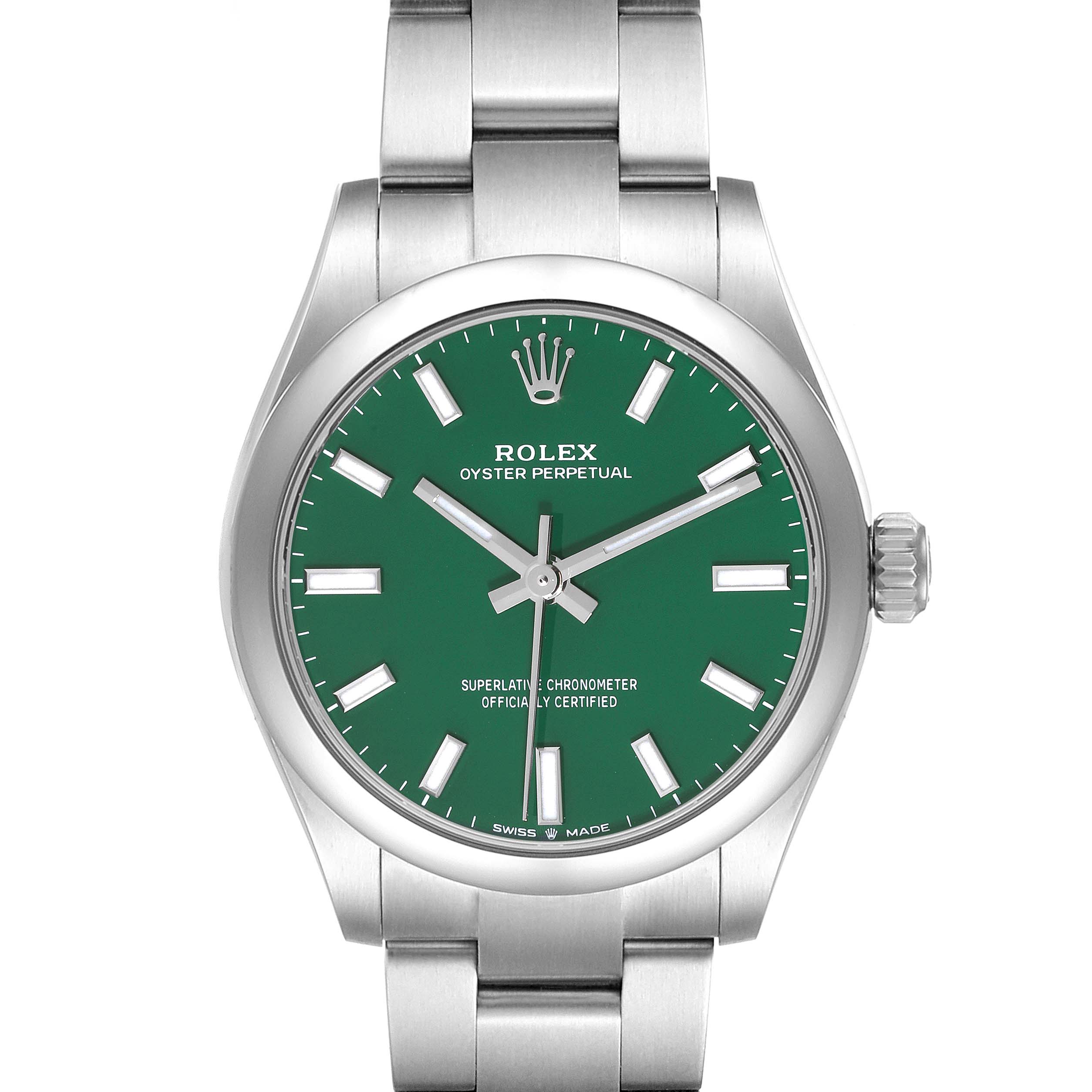 This image shows a front view of the Rolex Oyster Perpetual watch with a green dial and stainless steel bracelet.