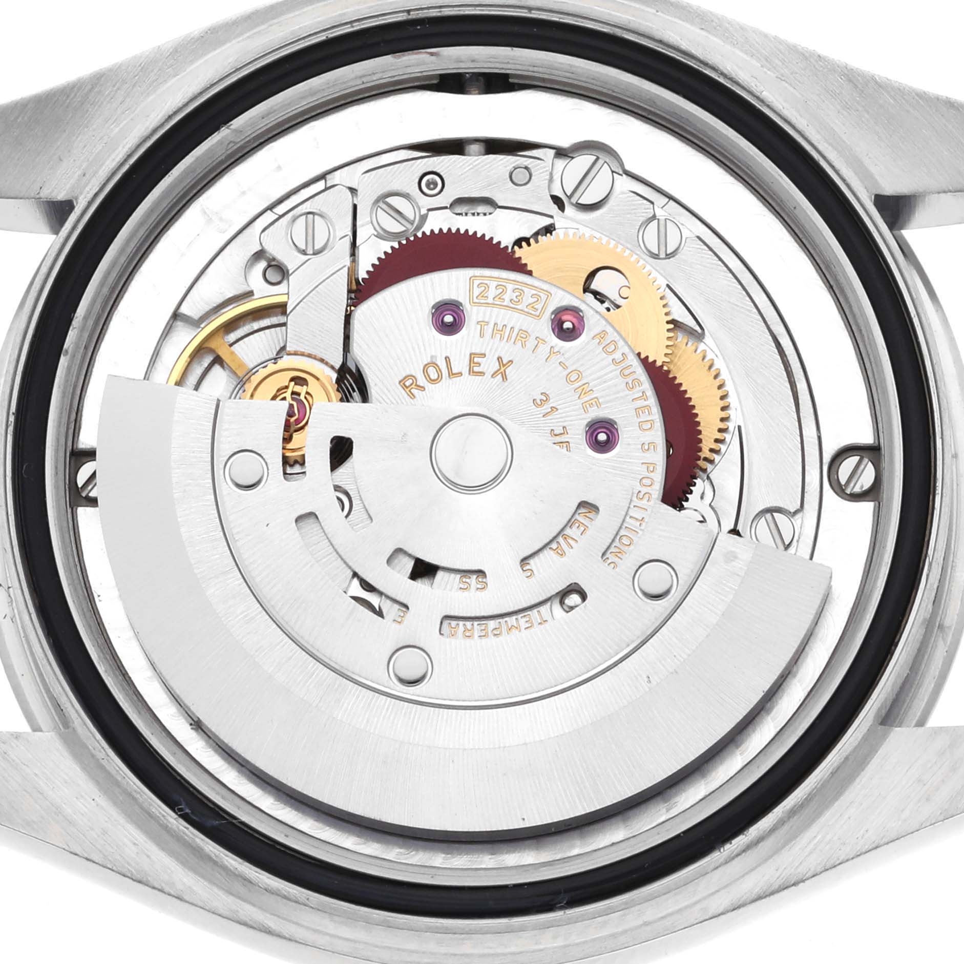 This image shows the back view of a Rolex Oyster Perpetual watch, highlighting its internal mechanical movement.