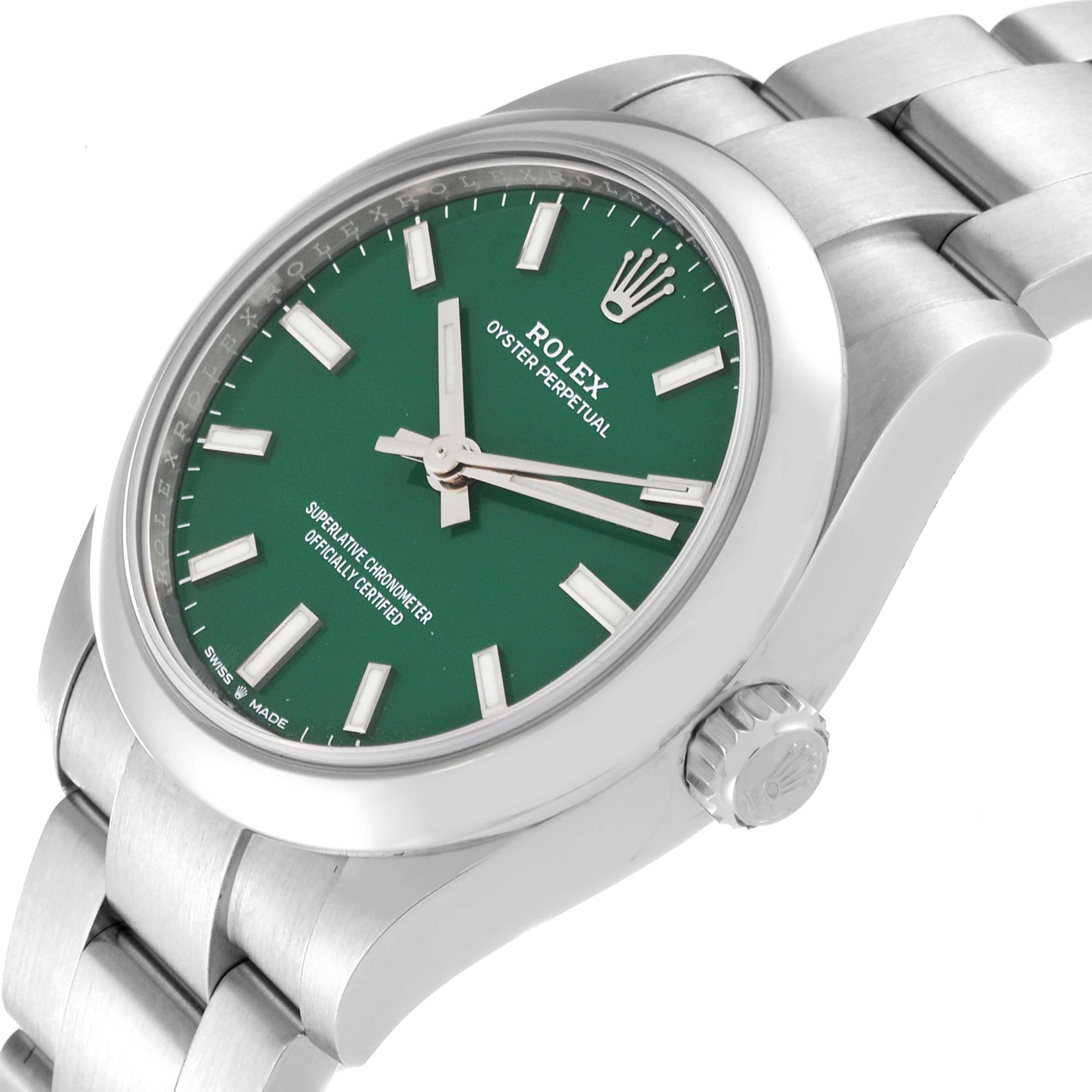 The image shows a Rolex Oyster Perpetual watch angled to display its green dial, crown, case, and part of the bracelet.