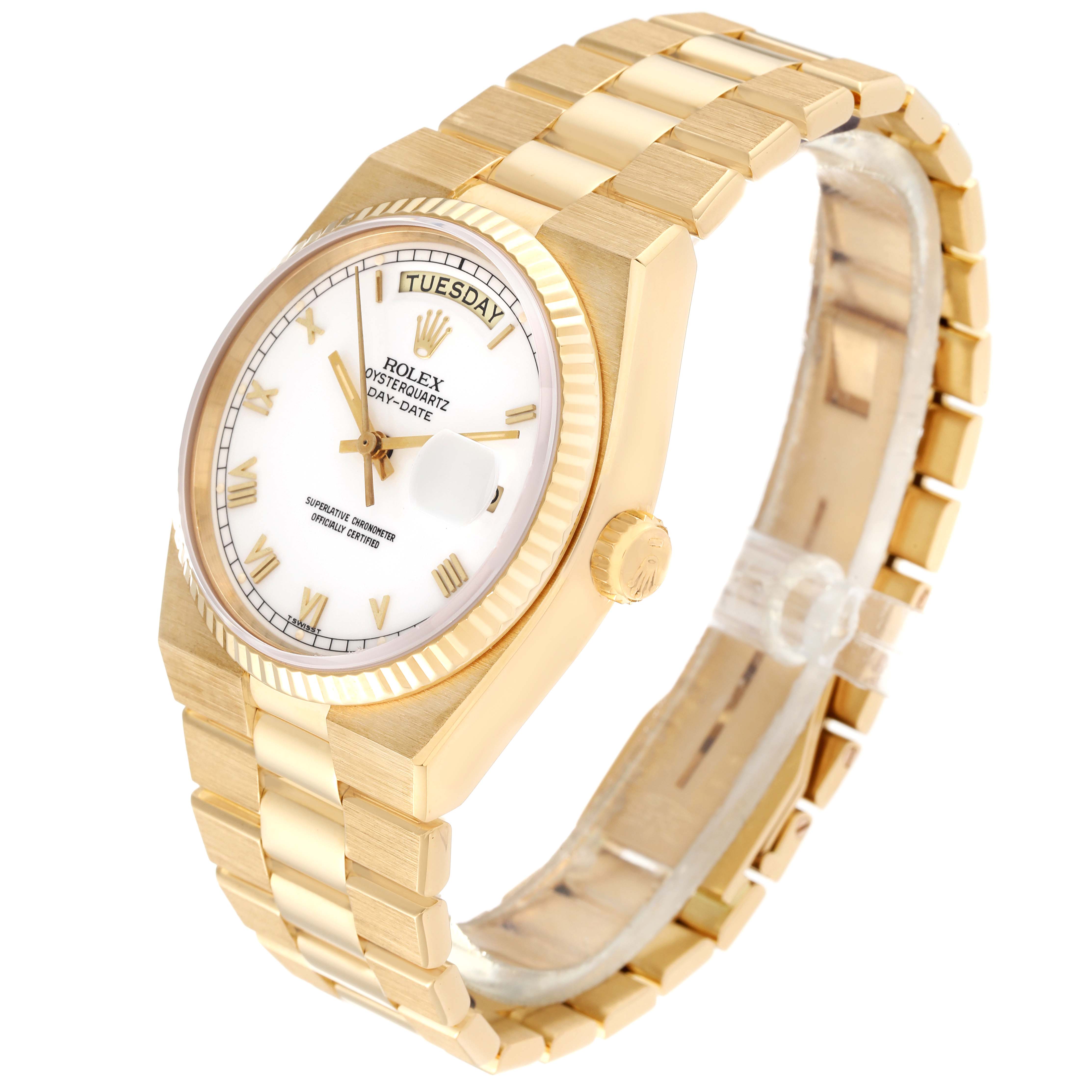 The Oysterquartz Rolex watch is shown at an angle displaying the face, bezel, crown, and a large portion of the bracelet.