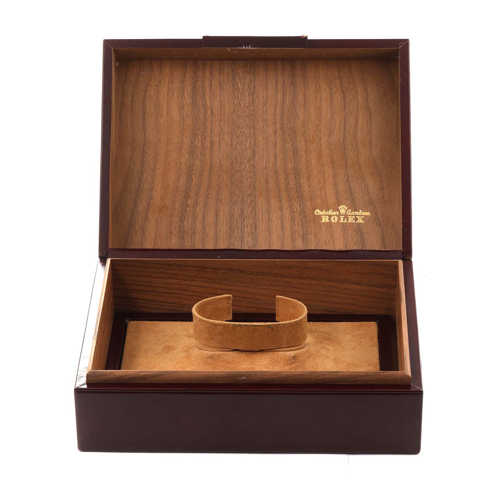 The image shows an open wooden case branded Rolex, without the Oysterquartz model watch inside.