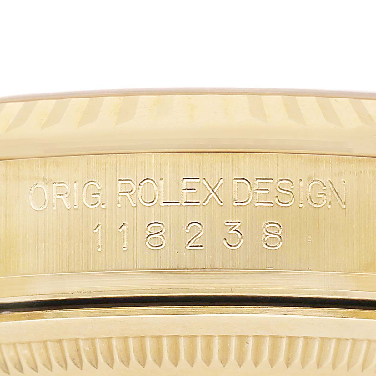 The image shows a close-up of the engraved side of a Rolex President 118238 Men's Yellow Gold Silver Dial model, highlighting the model number "118238."