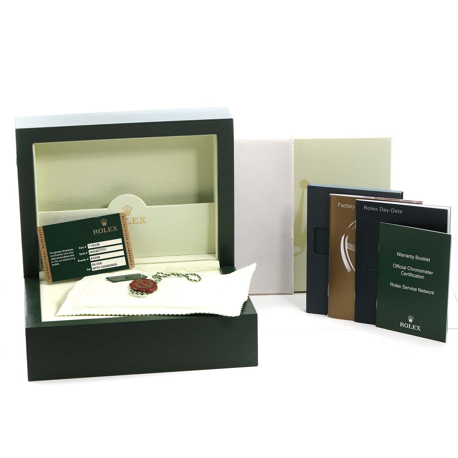 The image shows the Rolex President 118238 Men's Yellow Gold Silver Dial model packaging, with booklets, warranty card, cloth, and a tag, viewed from the front.