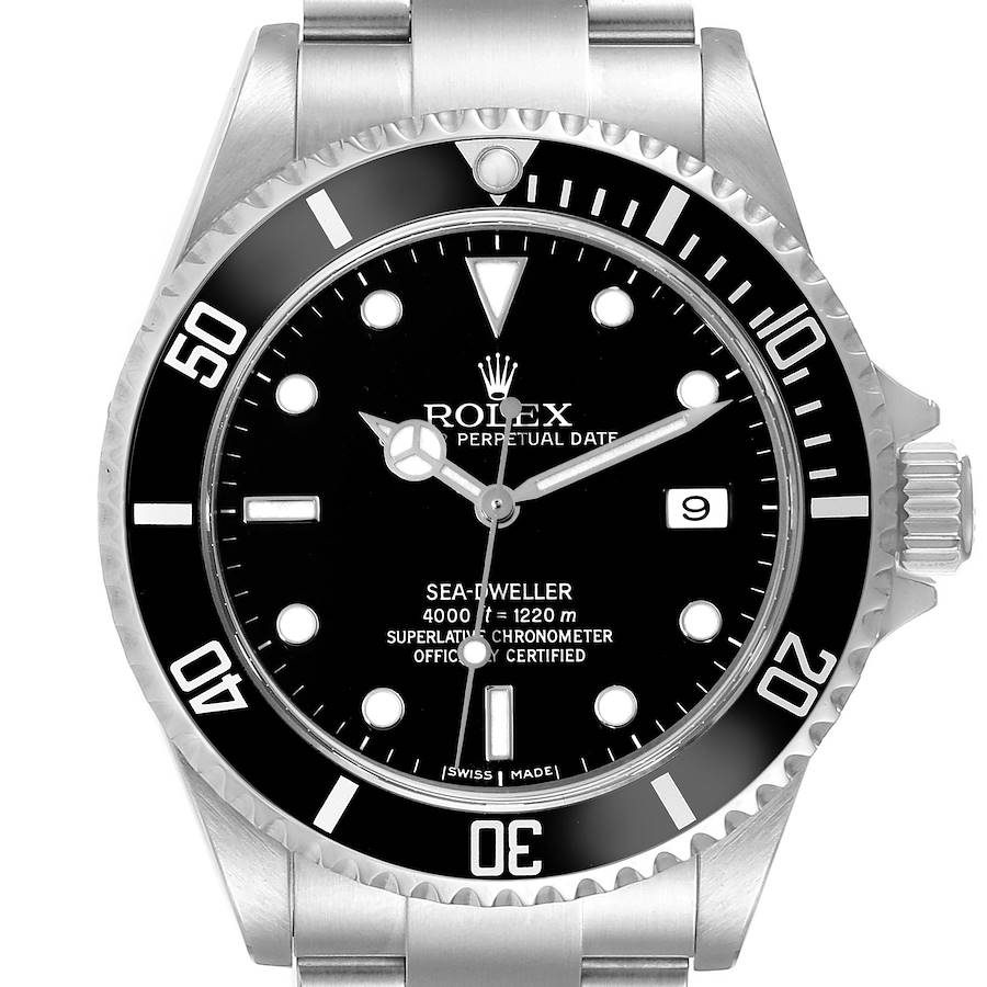 The image shows the front view of a Rolex Sea-Dweller watch, focusing on the dial, bezel, and part of the bracelet.