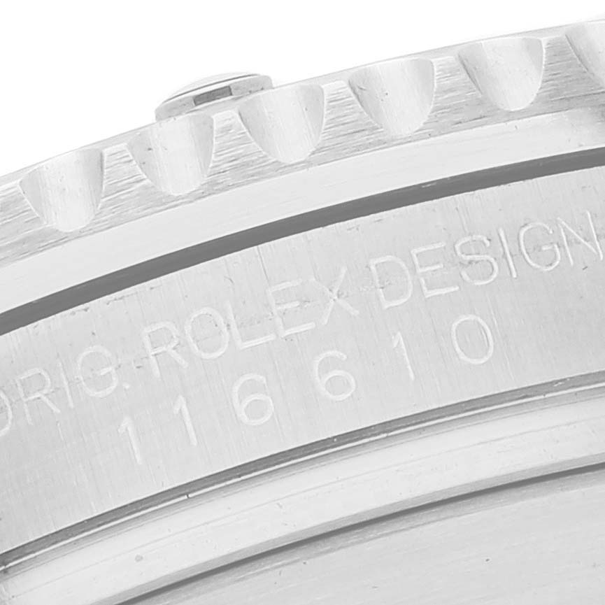 Close-up view of the engraved case on a Rolex Submariner 116610 Men
s Stainless Steel Black Dial 116610 Men
s Stainless Steel Black Dial watch showing model details.