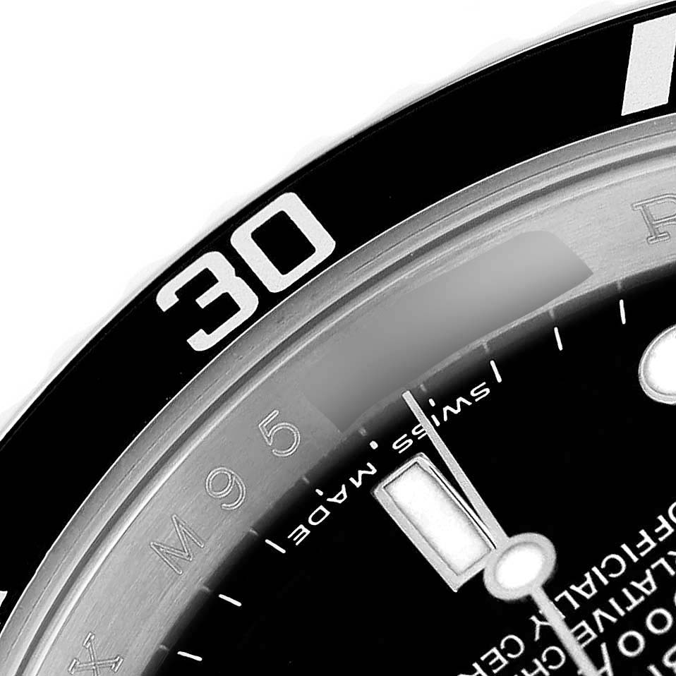 The image shows a close-up of the dial and bezel of a Rolex Submariner 16610 Men's Stainless Steel Black Dial, highlighting the 30-minute mark.