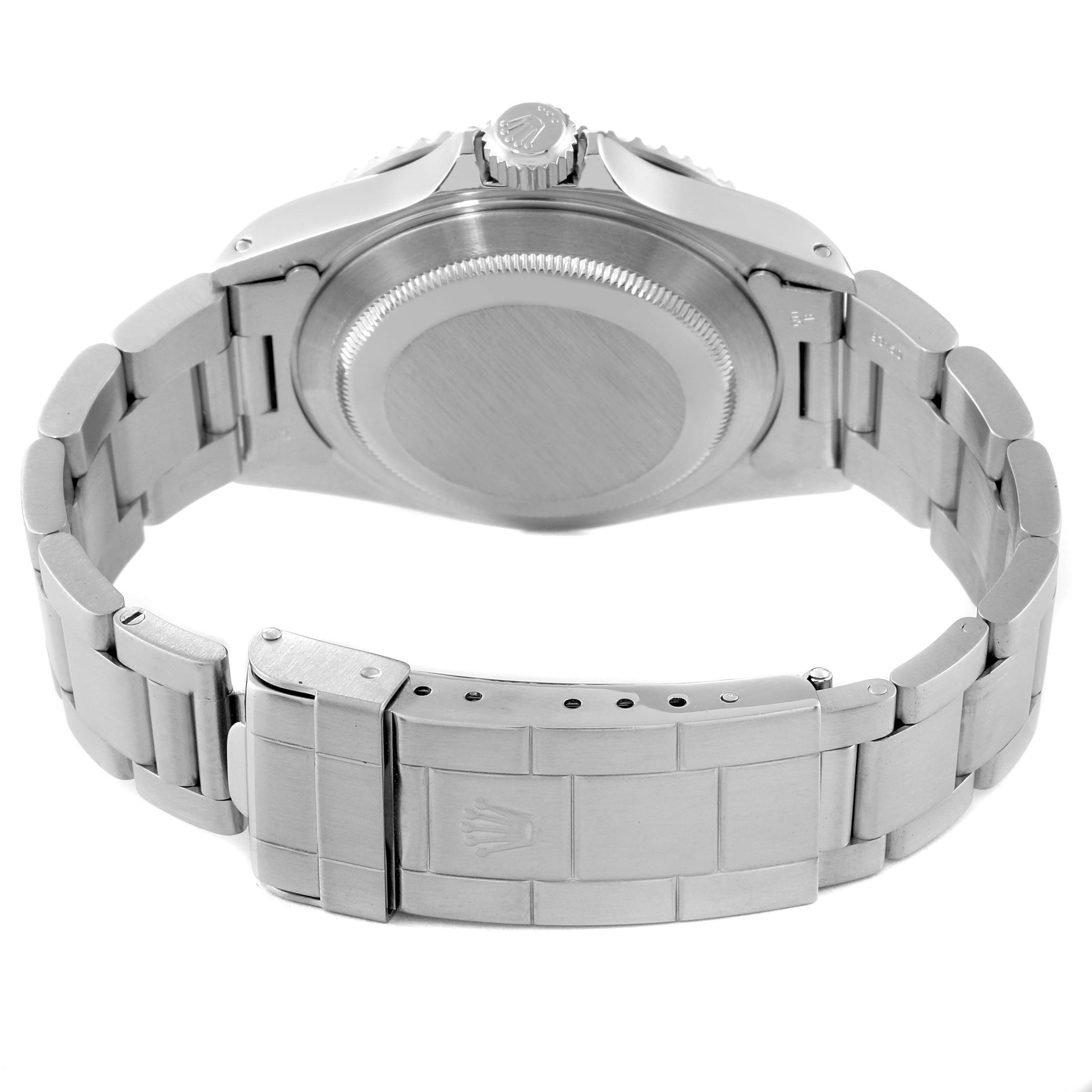 The image shows the back view of a Rolex Submariner 14060M Men
s Stainless Steel Black Dial 14060M Men
s Stainless Steel Black Dial watch, focusing on the case back and bracelet clasp.