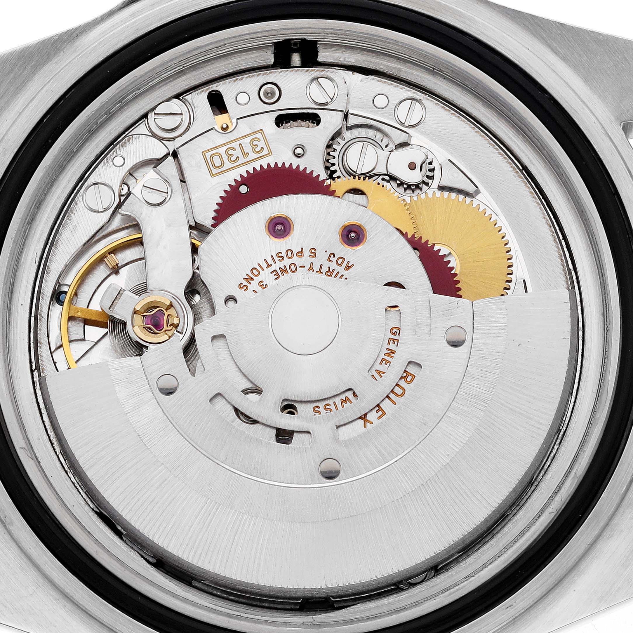 This image shows the intricate internal mechanics of a Rolex Submariner 14060M Men
s Stainless Steel Black Dial 14060M Men
s Stainless Steel Black Dial watch from a close-up, back view angle.