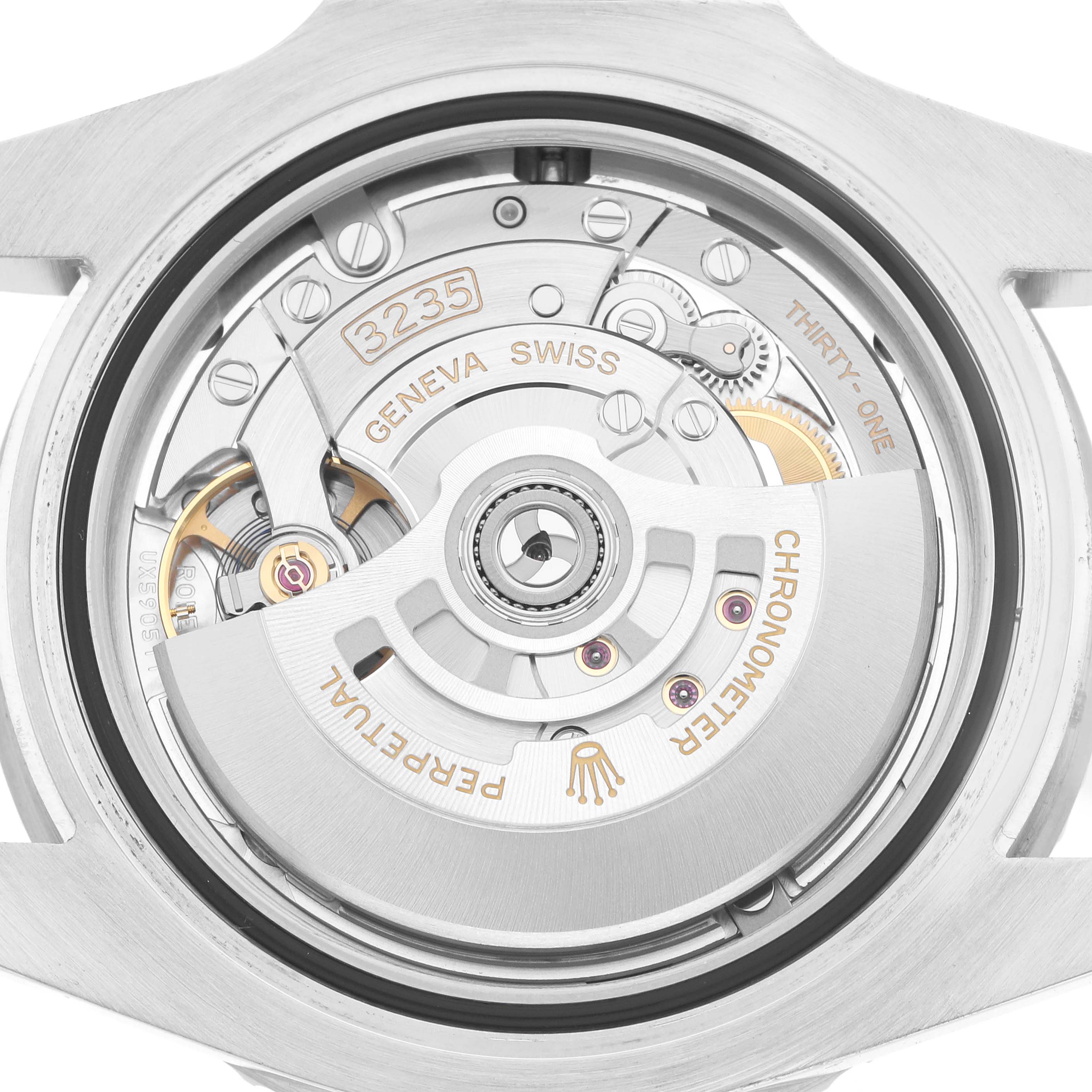 The image shows the Rolex Submariner 126610 Men
s Stainless Steel Black Dial
s movement, showcasing the intricate mechanism from a rear angle.