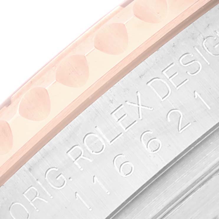 The image shows a close-up of the bezel and side of a Rolex Yacht-Master 116621 Men
s Steel and Gold (two tone) Black Dial 116621 Men
s Steel and Gold (two tone) Black Dial watch with the model number engraved.