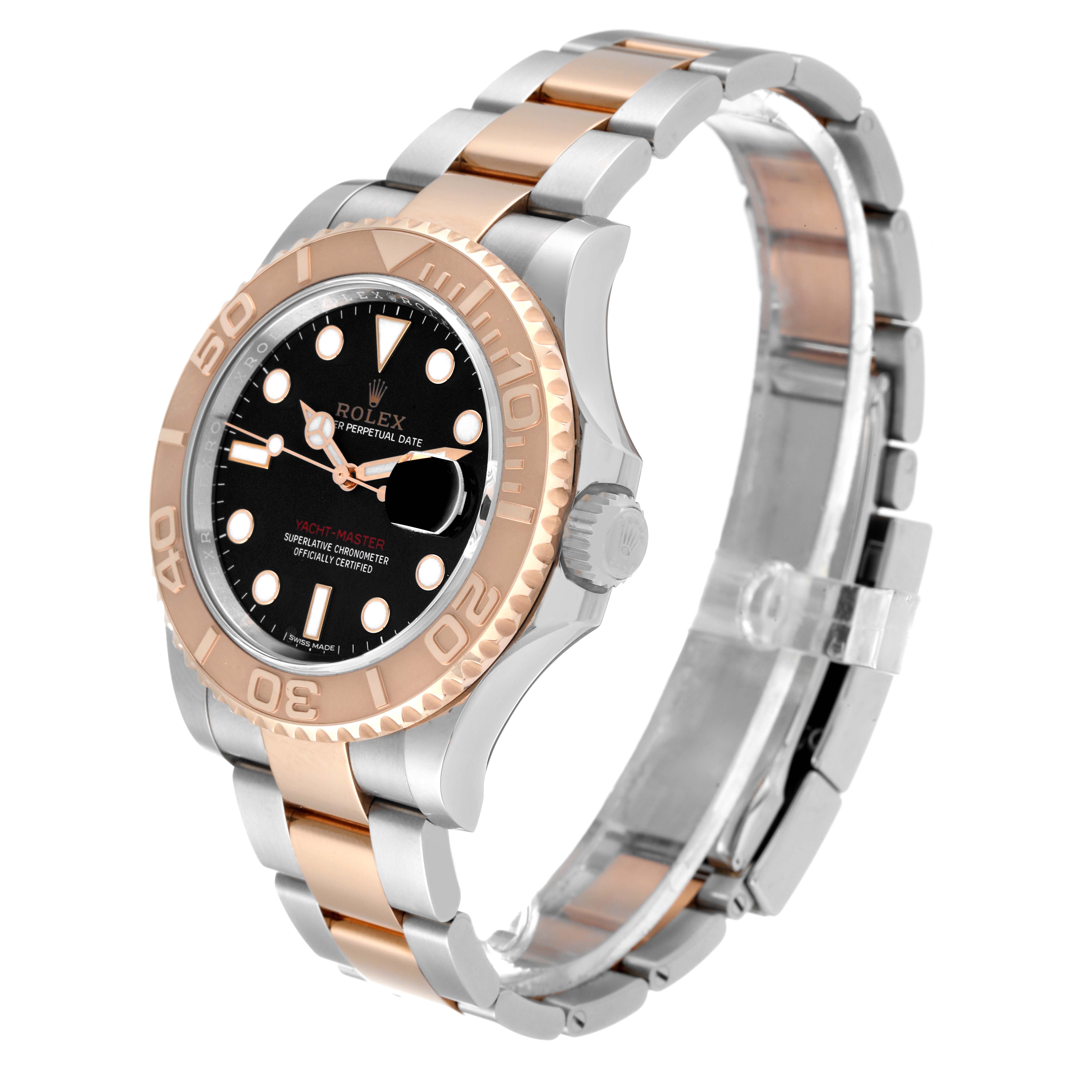 This Rolex Yacht-Master 116621 Men
s Steel and Gold (two tone) Black Dial 116621 Men
s Steel and Gold (two tone) Black Dial watch is shown at a three-quarter angle, displaying the face, bezel, and two-tone bracelet.