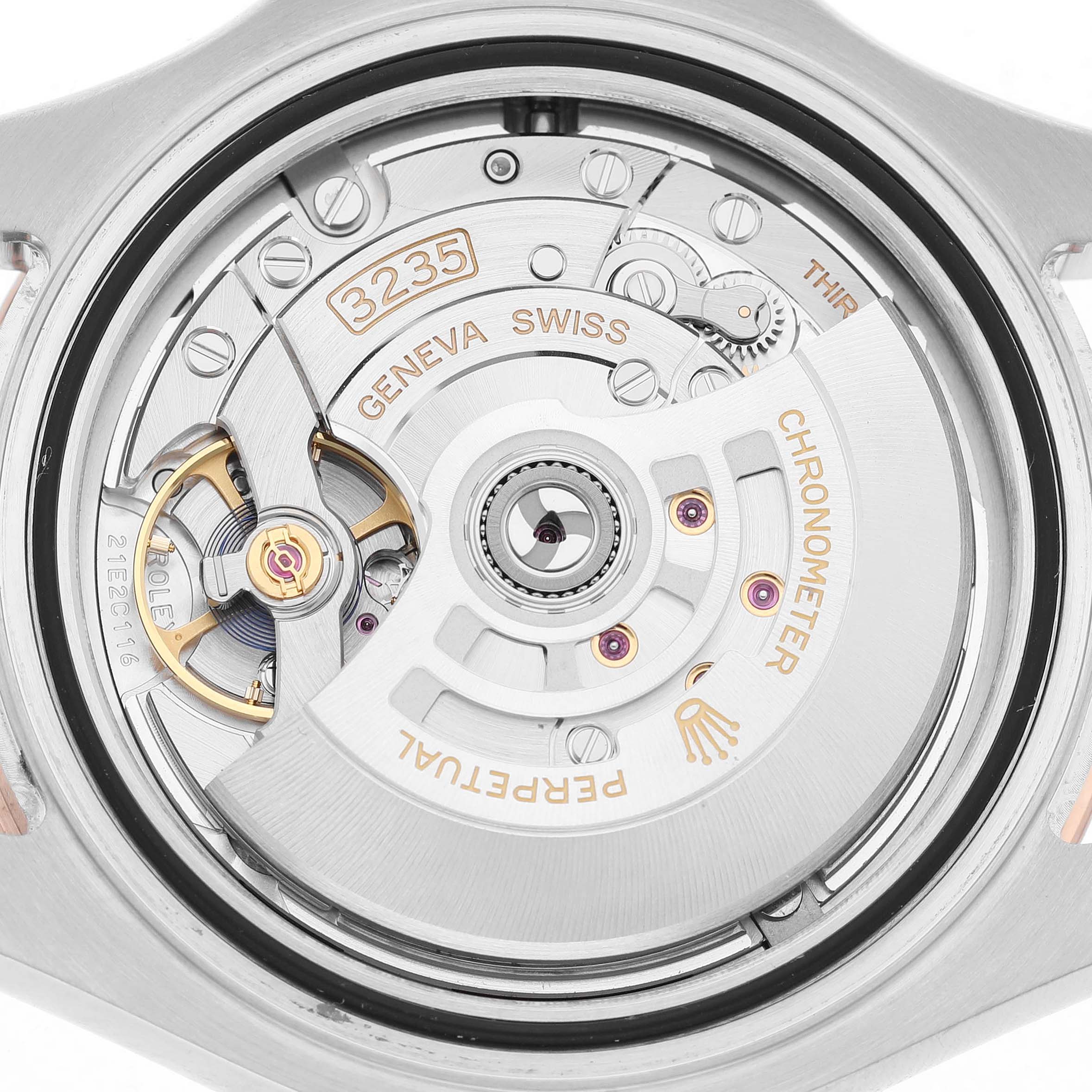 The image shows the movement and intricate inner mechanics of the Rolex Yacht-Master 126621 Men's Stainless Steel Brown Dial watch from a rear angle.