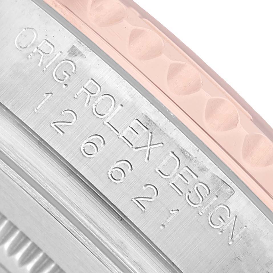 The image shows the side engraving of a Rolex Yacht-Master 126621 Men's Stainless Steel Brown Dial, highlighting model details.