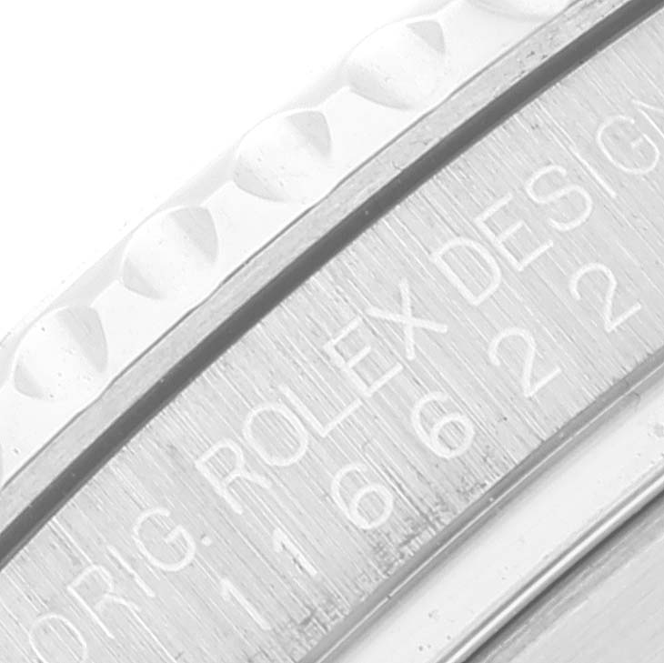 The image shows a close-up view of the bezel and case edge with engravings on a Rolex Yacht-Master 116622 Men's Stainless Steel Blue Dial 116622 Men's Stainless Steel Blue Dial model.