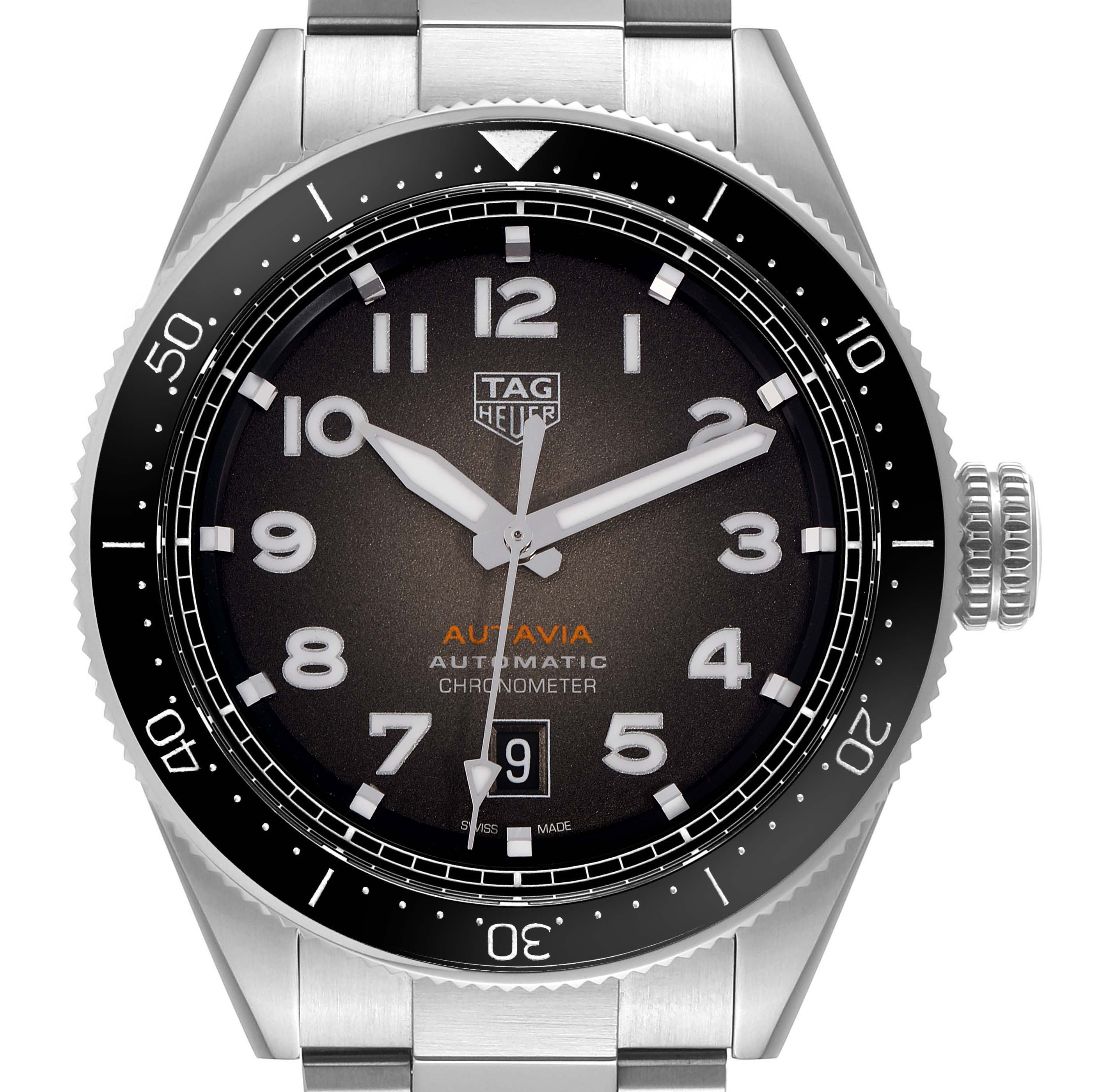 The Tag Heuer Autavia WBE5114 Men
s Stainless Steel Brown Dial watch is shown from the front, highlighting the dial, bezel, crown, and part of the bracelet.