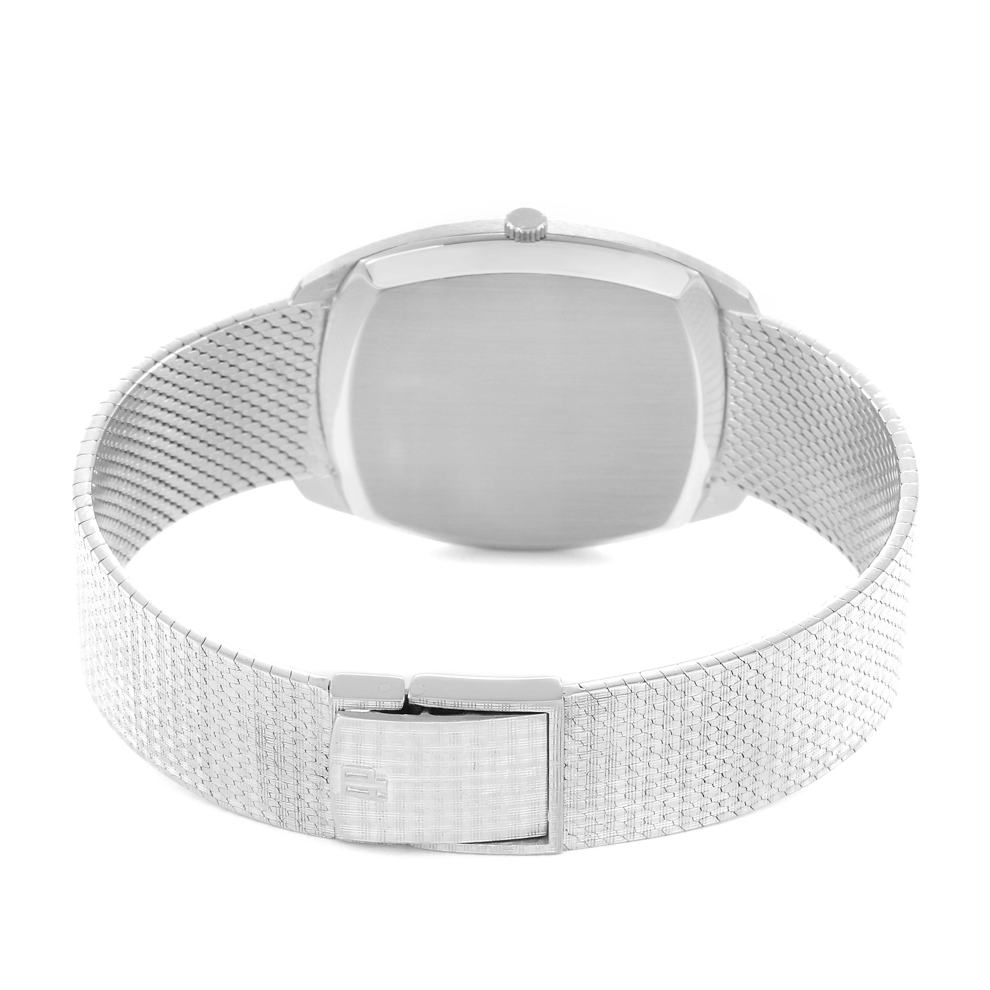 The image shows the back of the Audemars Piguet Vintage 5279 Men
s White Gold Silver Dial watch, highlighting its clasp and mesh bracelet.