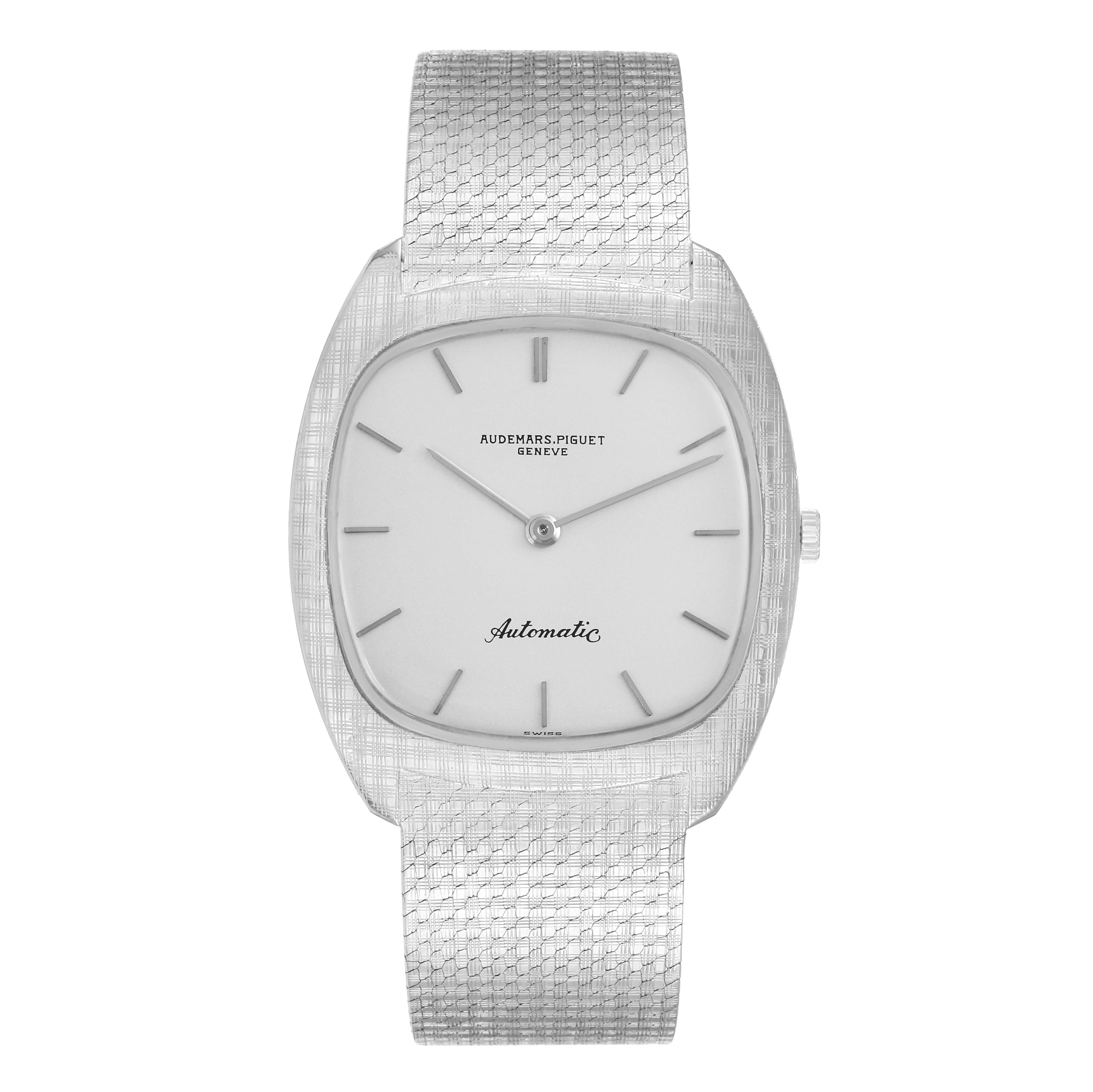 The Audemars Piguet Vintage 5279 Men
s White Gold Silver Dial watch is shown from a front angle, highlighting its face, dial, and textured metal bracelet.