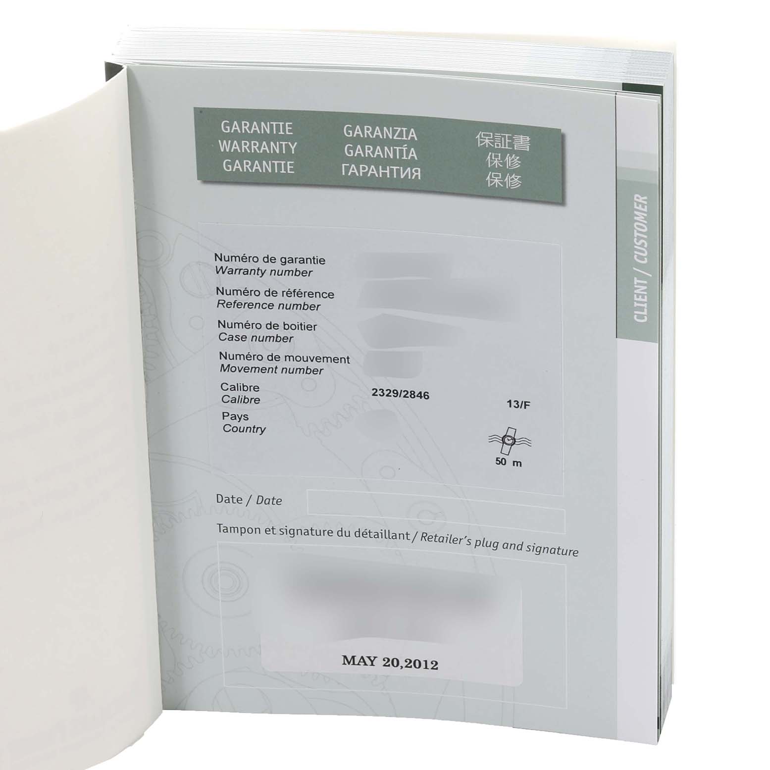 The image shows the warranty booklet for the Audemars Piguet Royal Oak 26120ST.OO.1220ST.03 Men's Stainless Steel Black Dial 26120ST.OO.1220ST.03 Men's Stainless Steel Black Dial model, detailing the warranty number, reference number, case number, movement number, and purchase date.