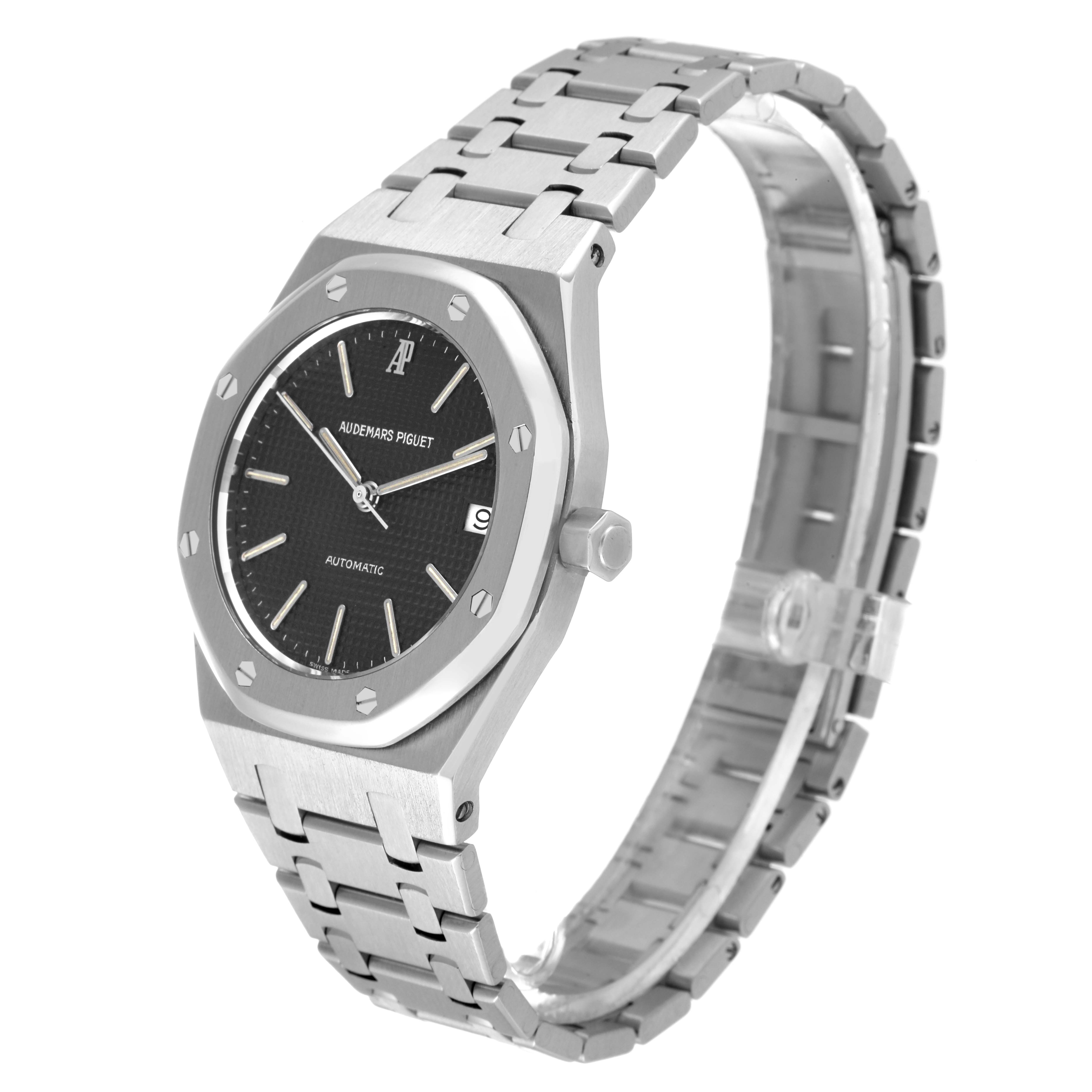 The image shows a side-angle view of the Audemars Piguet Royal Oak 14790ST Men's Stainless Steel Grey Dial 14790ST Men's Stainless Steel Grey Dial watch, highlighting the face, bezel, crown, and part of the bracelet.