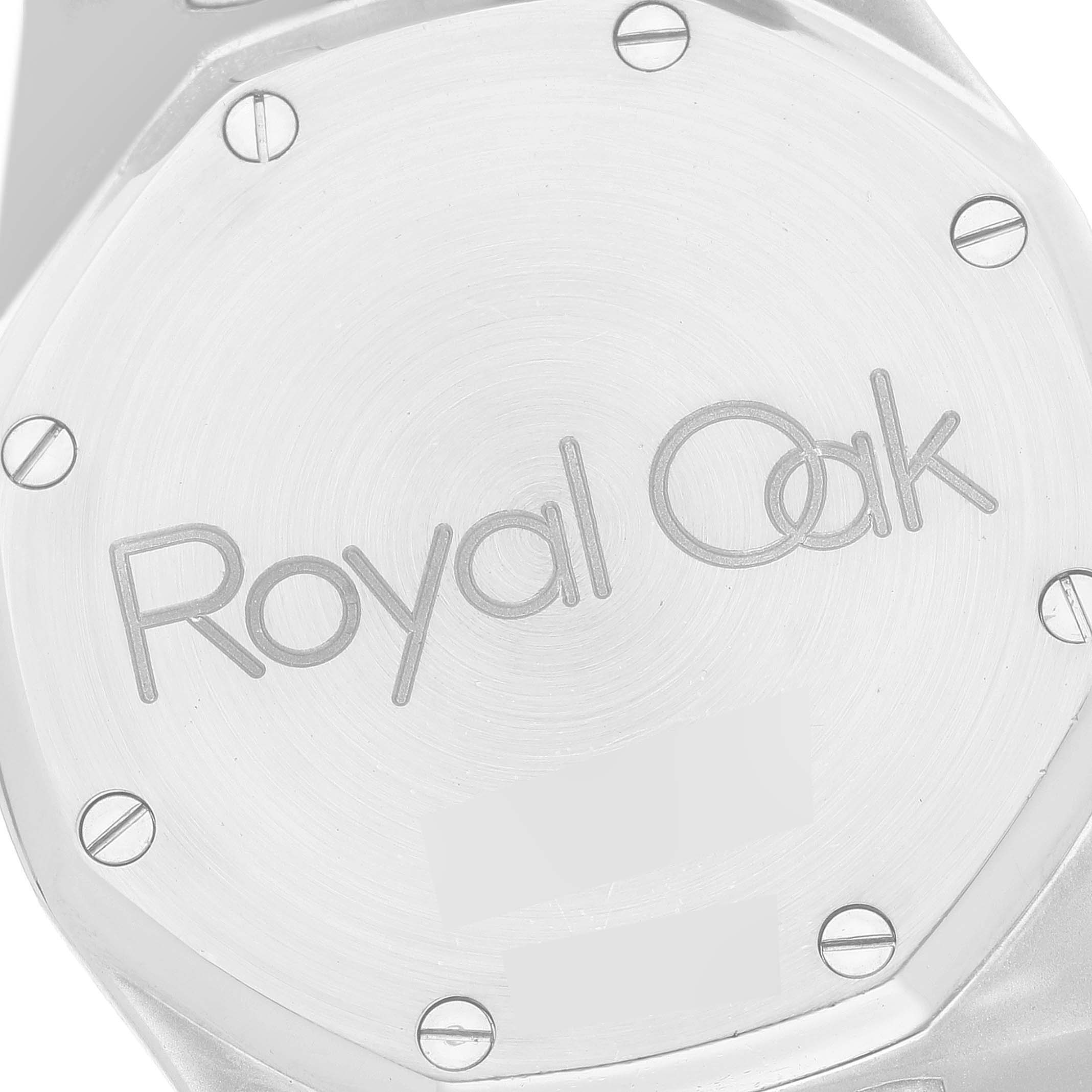 This image shows the back case of an Audemars Piguet Royal Oak 14790ST Men's Stainless Steel Grey Dial 14790ST Men's Stainless Steel Grey Dial watch, highlighting the "Royal Oak" engraving and visible screws.