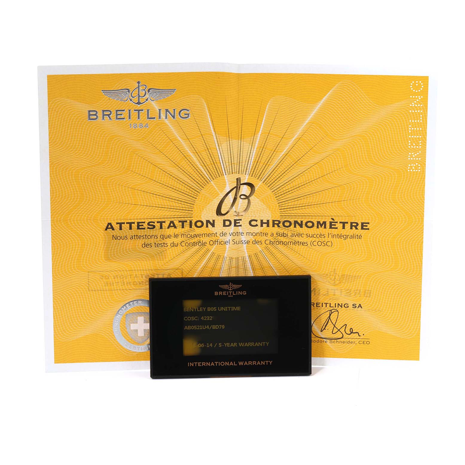 The image shows the certificate and warranty card for the Bentley model by Breitling.