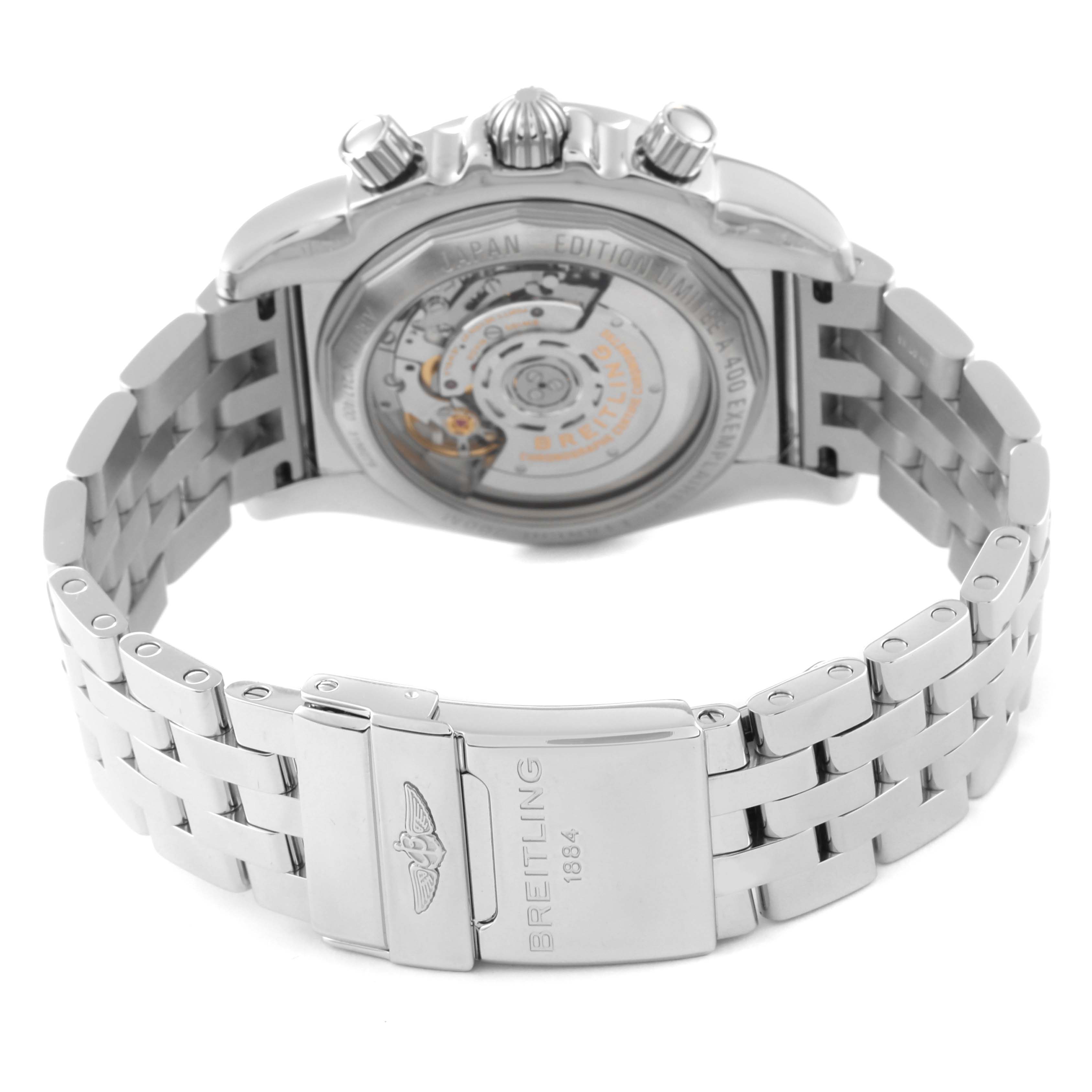 The image shows the back view of the Breitling Chronomat AB01114K/BD34 Men's Stainless Steel Mother of Pearl Dial AB01114K/BD34 Men's Stainless Steel Mother of Pearl Dial watch, highlighting the movement through the transparent case back and the bracelet clasp.