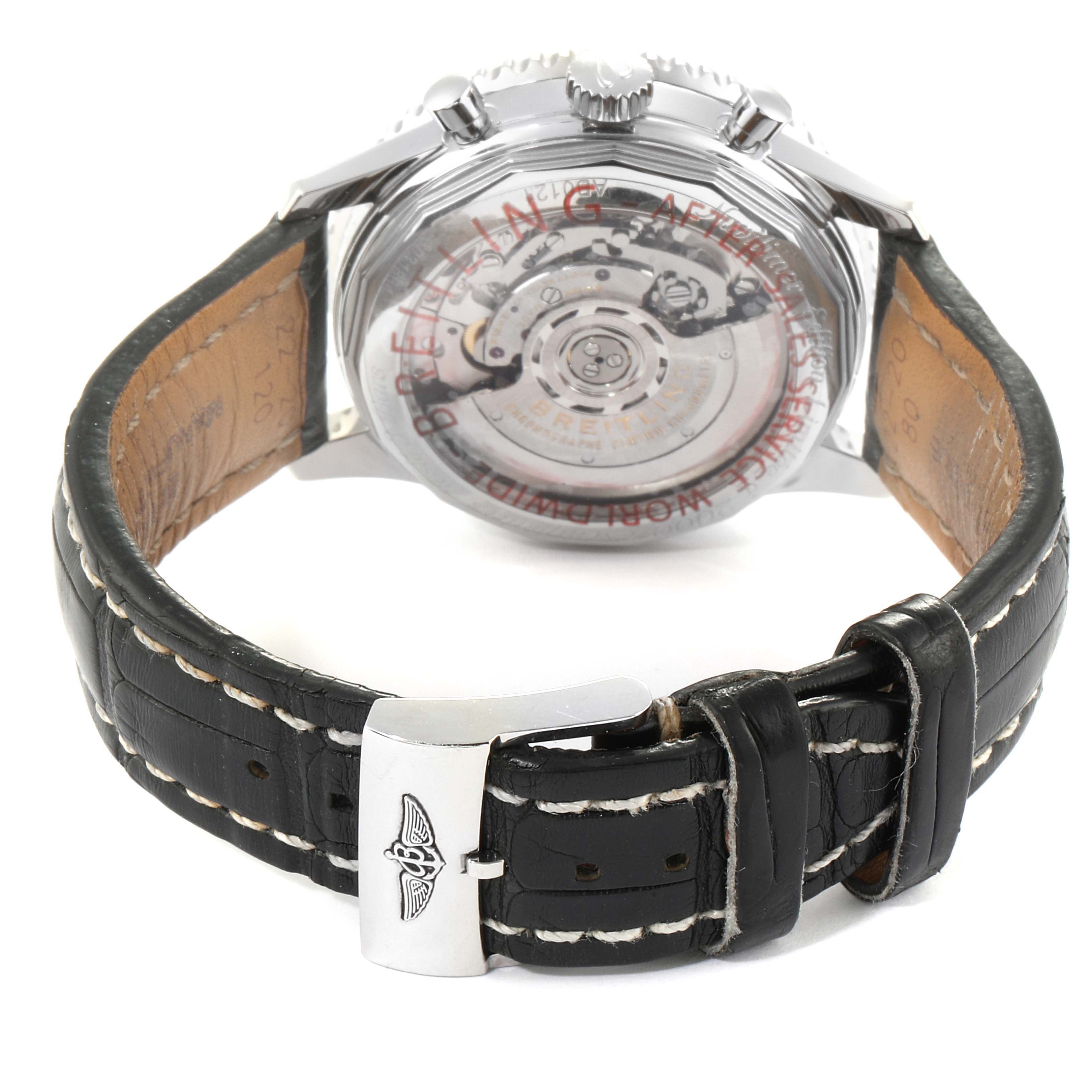 This image shows the backside of a Breitling Navitimer AB0121 Men's Stainless Steel Black Dial AB0121 Men's Stainless Steel Black Dial watch, focusing on the transparent case back and black leather strap.