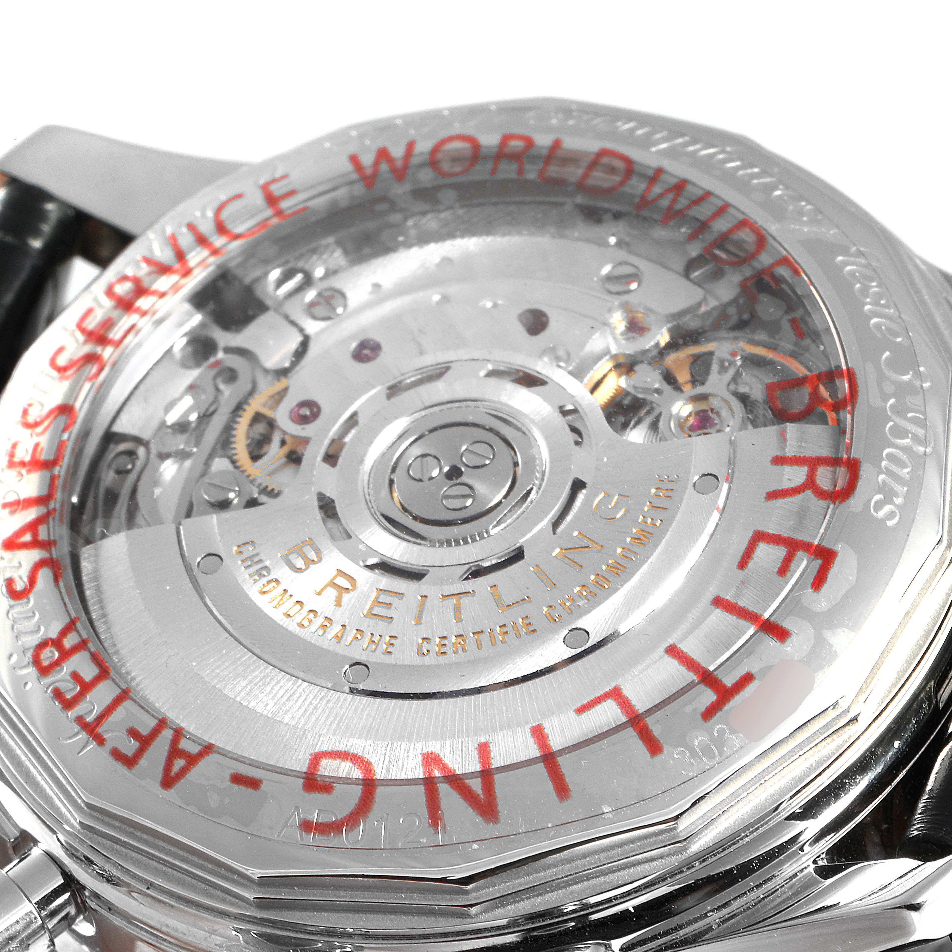 This image shows the back view of a Breitling Navitimer AB0121 Men's Stainless Steel Black Dial AB0121 Men's Stainless Steel Black Dial watch, highlighting its internal mechanism and engravings.