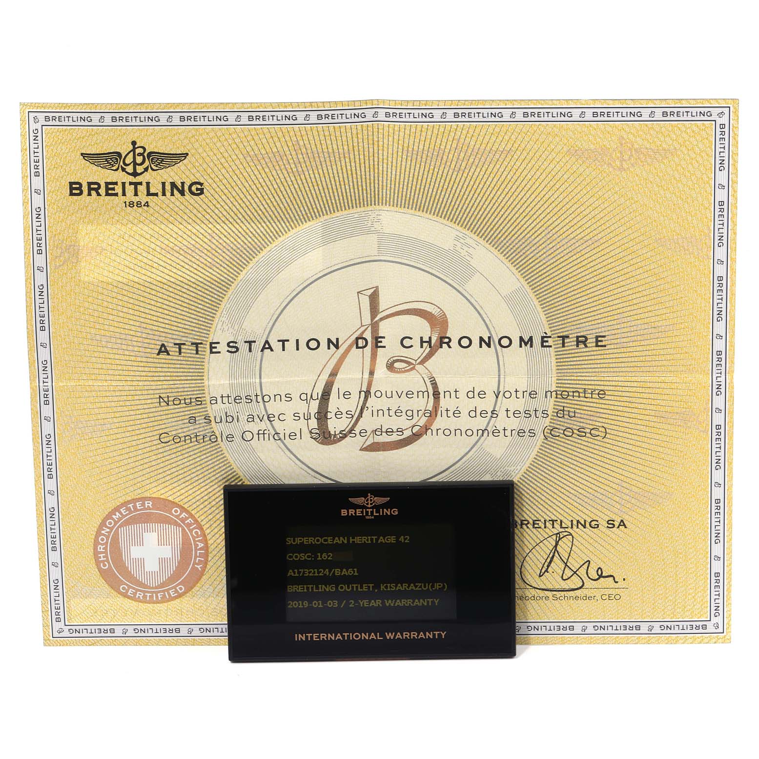 The image shows the warranty card and chronometer certificate for a Breitling Superocean A17321 Men's Stainless Steel Black Dial A17321 Men's Stainless Steel Black Dial watch.