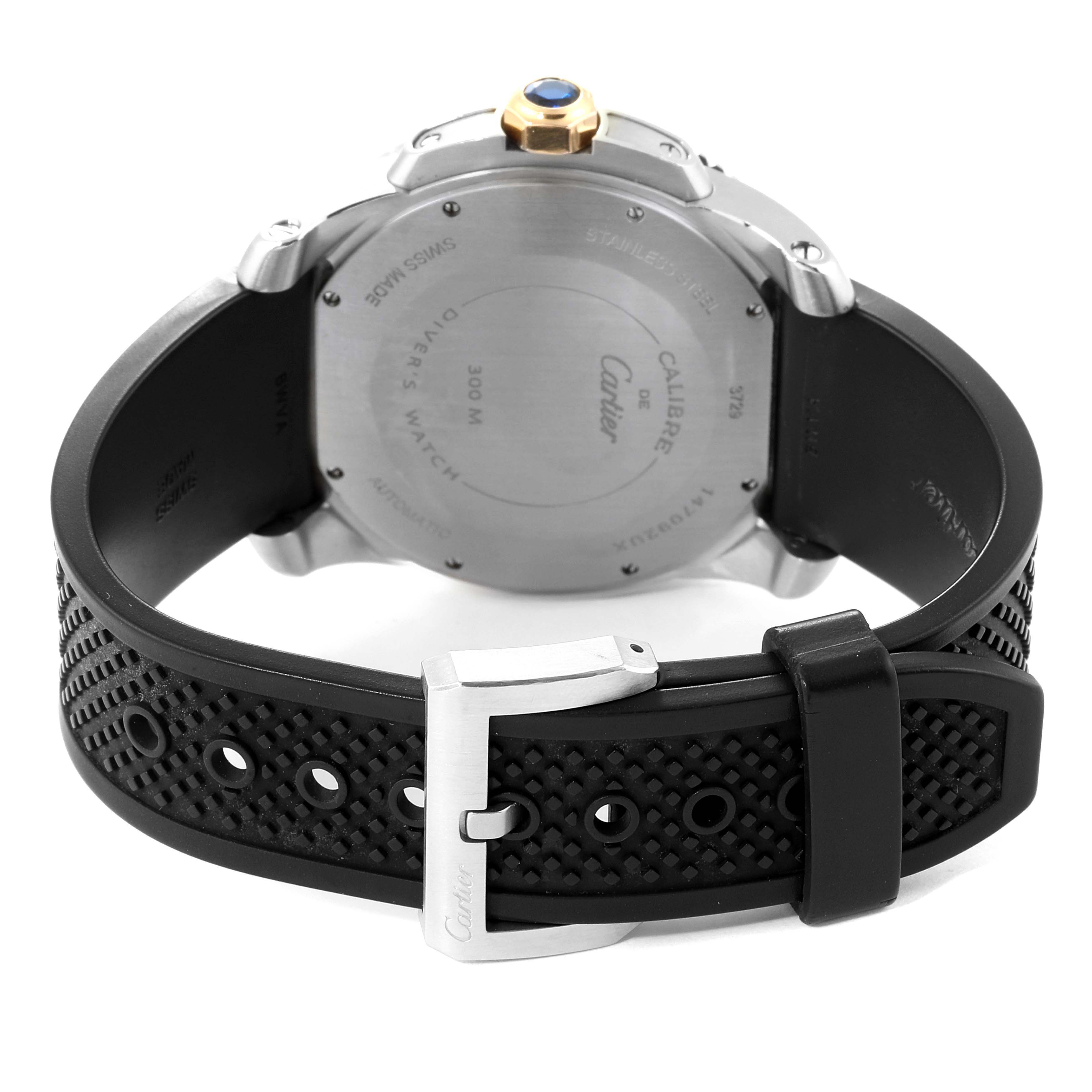 The image shows the back view of the Calibre de Cartier watch by Cartier, displaying its case back, black strap, and buckle.