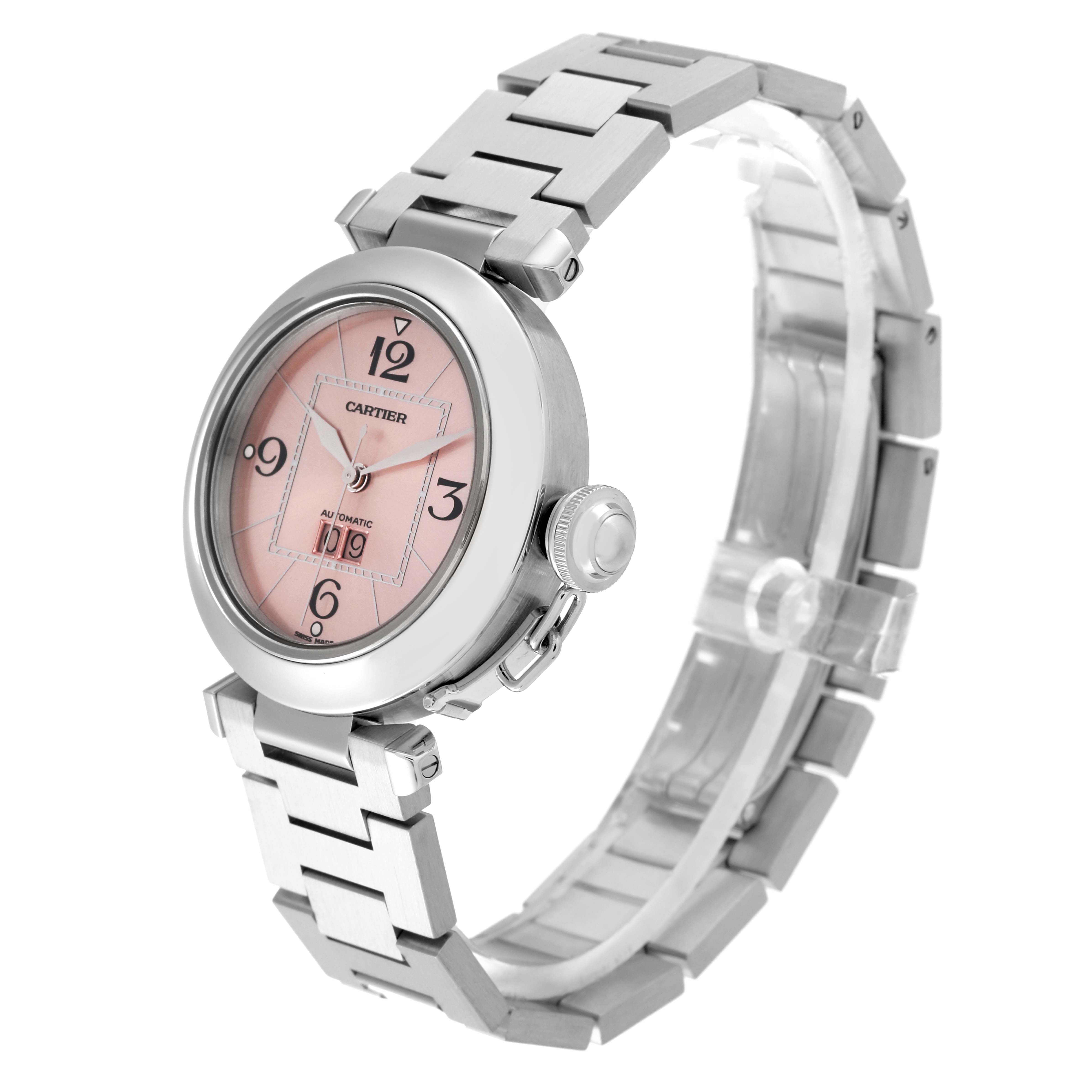 The Cartier Pasha W31058M7 Women's Stainless Steel Pink Dial W31058M7 Women's Stainless Steel Pink Dial watch is shown from a 3/4 angle, highlighting the face, bezel, crown, and bracelet.