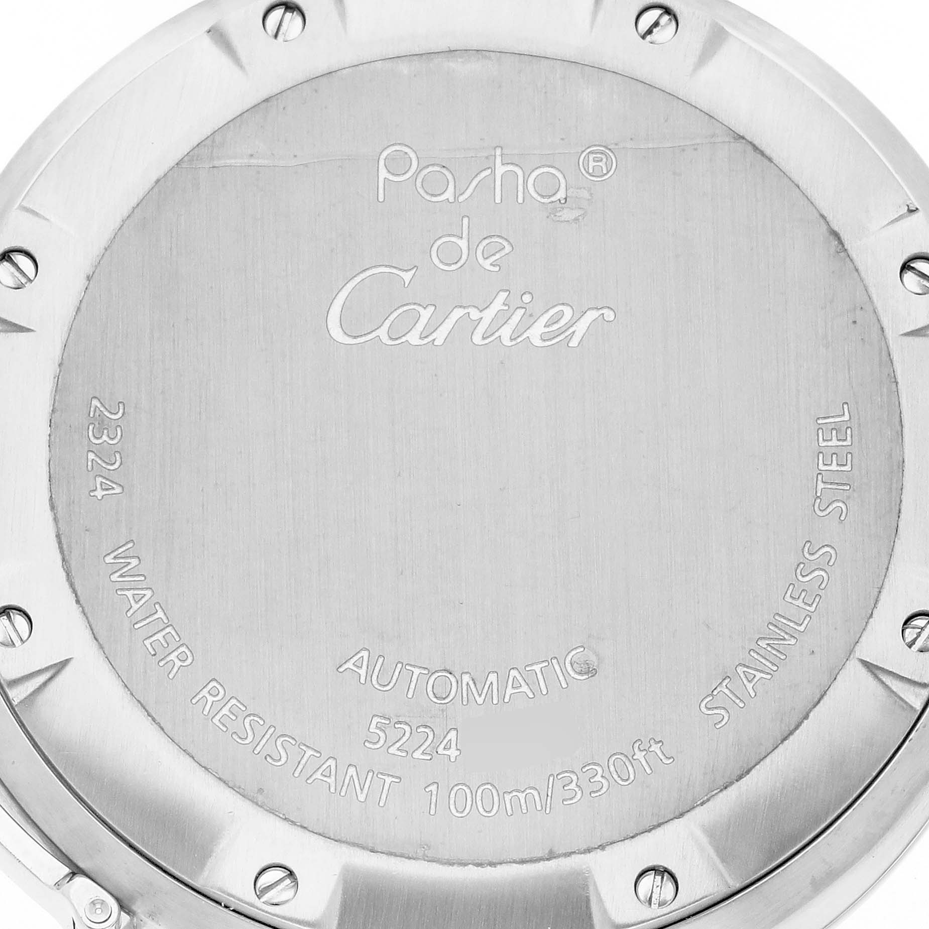 The image shows the stainless steel case back of a Cartier Pasha W31074M7 Men's Stainless Steel White Dial W31074M7 Men's Stainless Steel White Dial watch with engraved details including model and specifications.