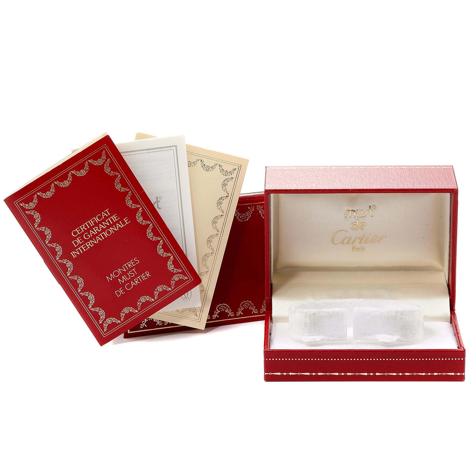 The image shows the packaging and documentation for a Santos model watch by Cartier.