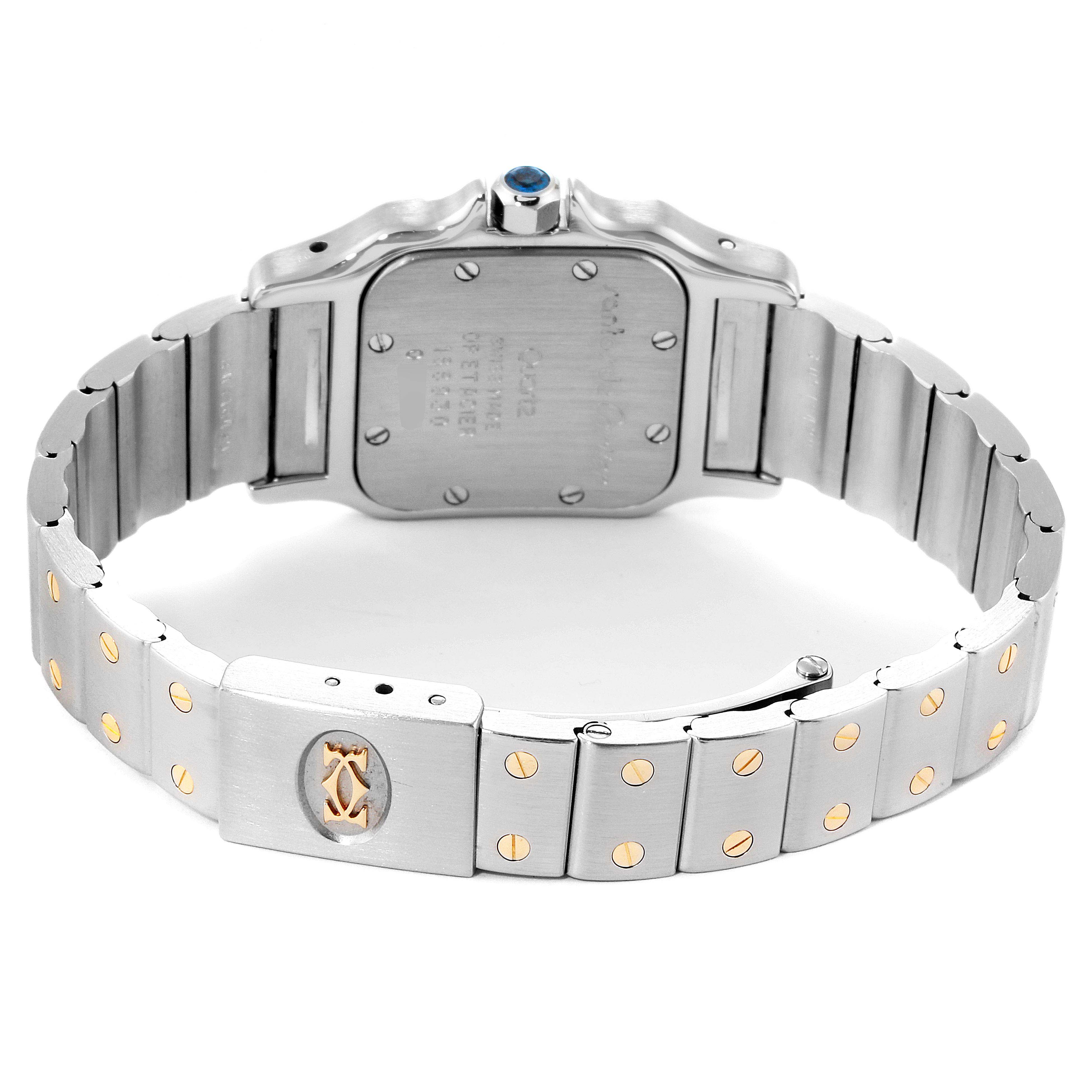 The image shows the backside and bracelet of a Cartier Santos 166930 Women
s Steel and Gold (two tone) Silver Dial 166930 Women
s Steel and Gold (two tone) Silver Dial watch, highlighting its clasp and screw details.