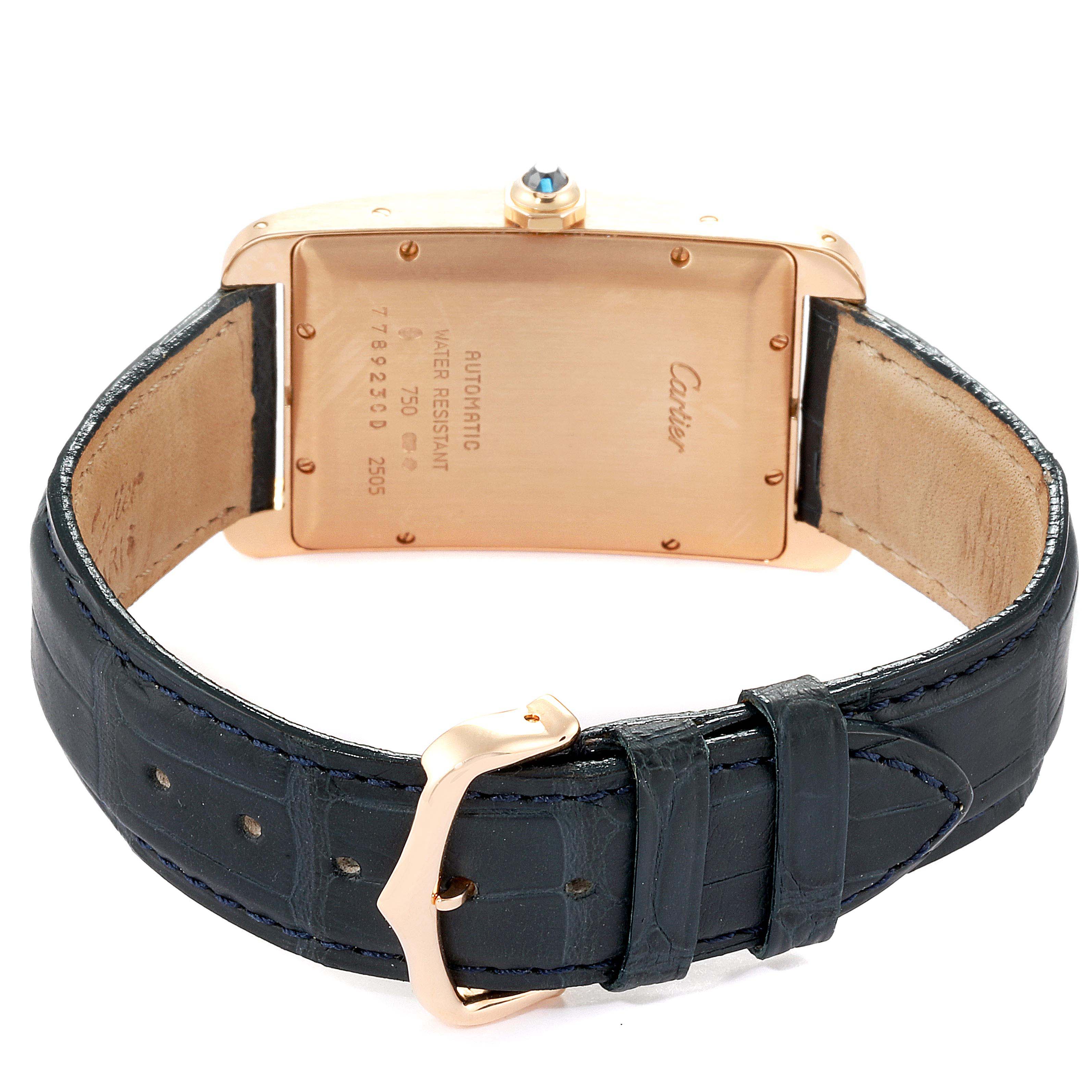 The image shows the back view of a Cartier Tank Americaine 2505 Men's Rose Gold Silver Dial 2505 Men's Rose Gold Silver Dial watch, highlighting the case back and leather strap.