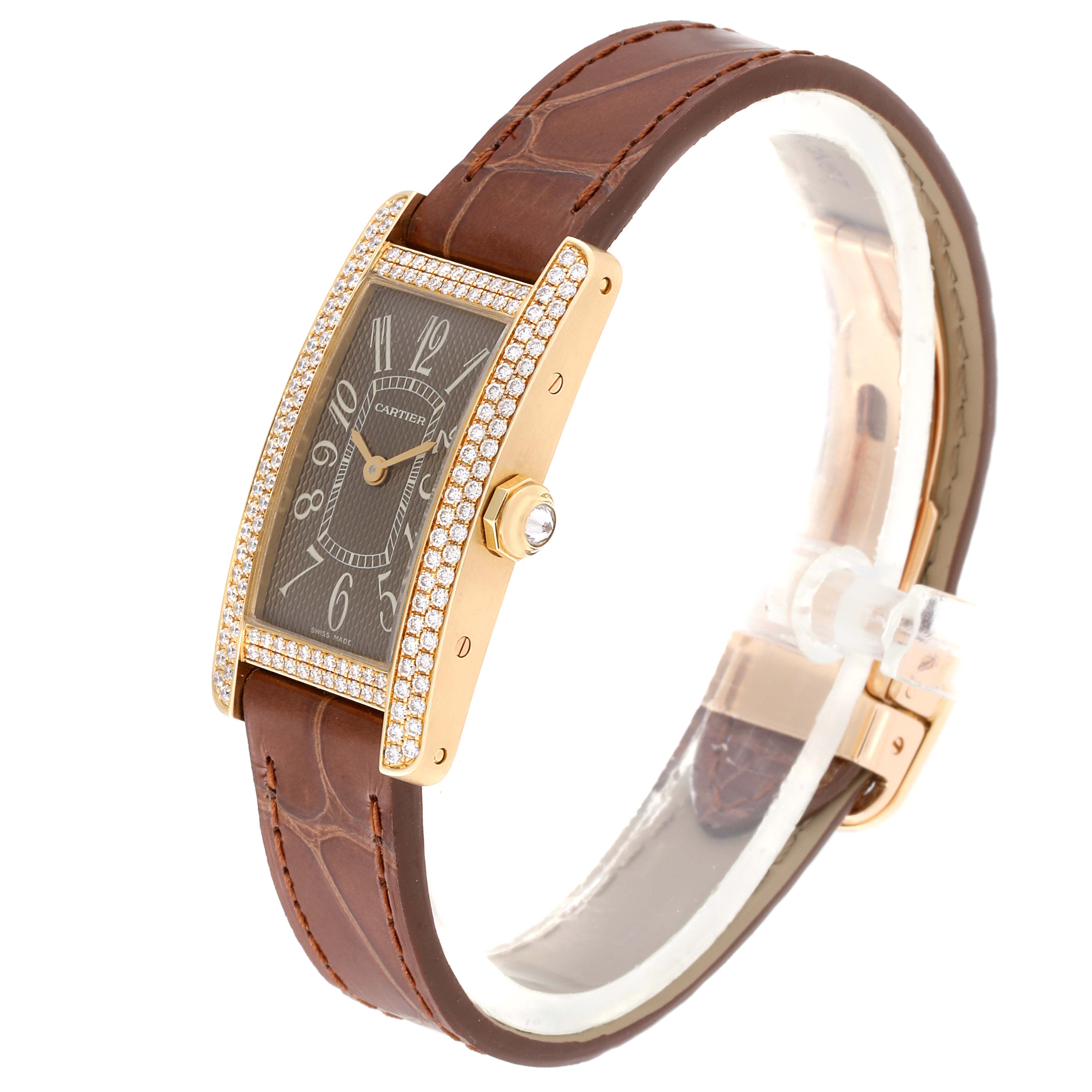 The image shows a Cartier Tank Américaine watch at a side angle, highlighting its rectangular dial, leather strap, and diamond-set case.