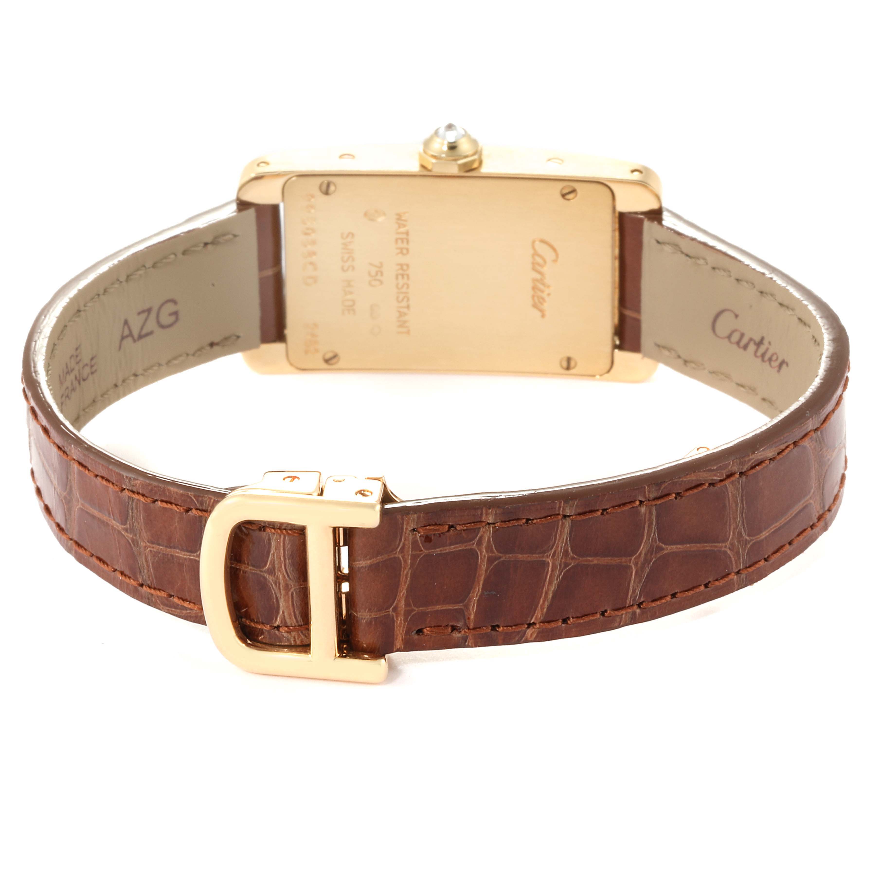 The image shows the back of a Cartier Tank Americaine 2482 Women's Yellow Gold Brown Dial 2482 Women's Yellow Gold Brown Dial watch, highlighting the leather strap and clasp.