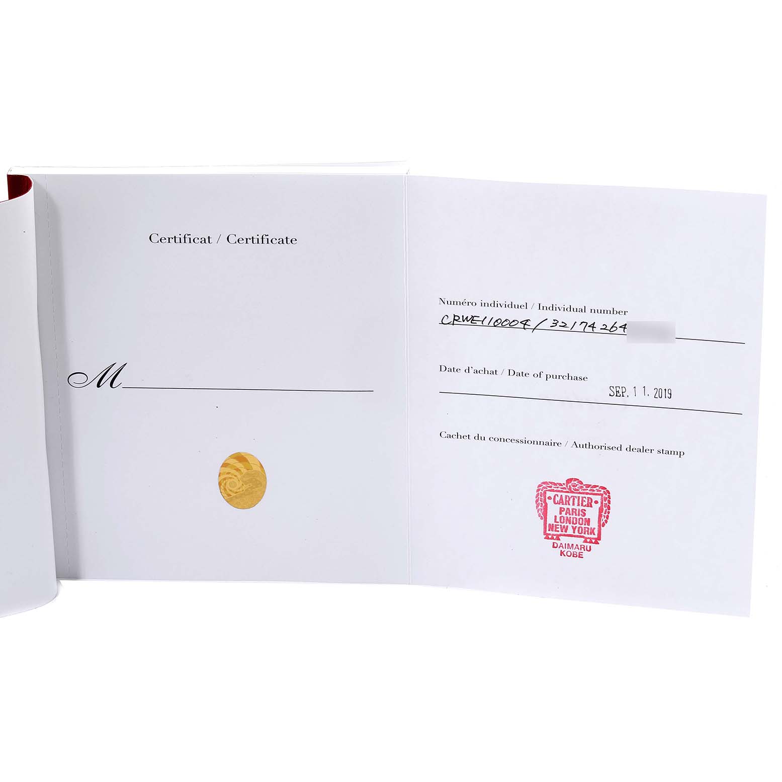 The image shows the certificate and paper documentation for the Cartier Tank Française watch.